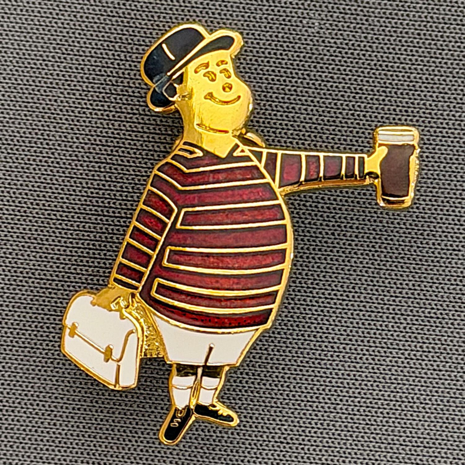 Reference Number: BCGEN083
Size: H 28.8 mm x W 20.9 mm
Pin Type: Brooch Pin
Plating: Gold
Value: £20
Manufacturer: Bradford City Badges
Comments: City Gent Beer Cloisonne, White Briefcase. One Off Badge.