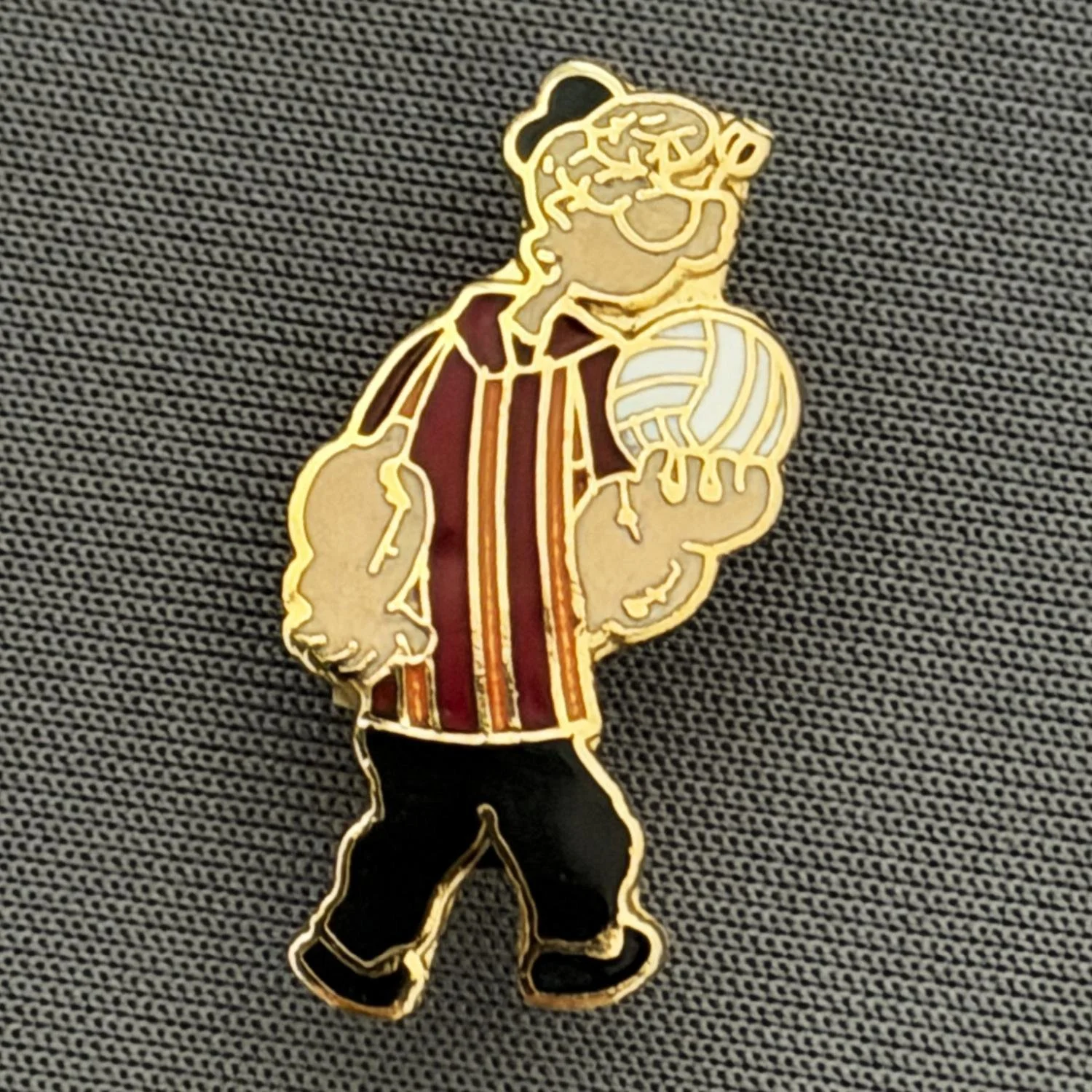 Reference Number: BCCTN011
Size: H 25 mm x W 14.5 mm
Pin Type: Brooch Pin
Plating: Gold
Value: £6
Manufacturer: Not Known
Comments: Popeye in Bradford City Kit