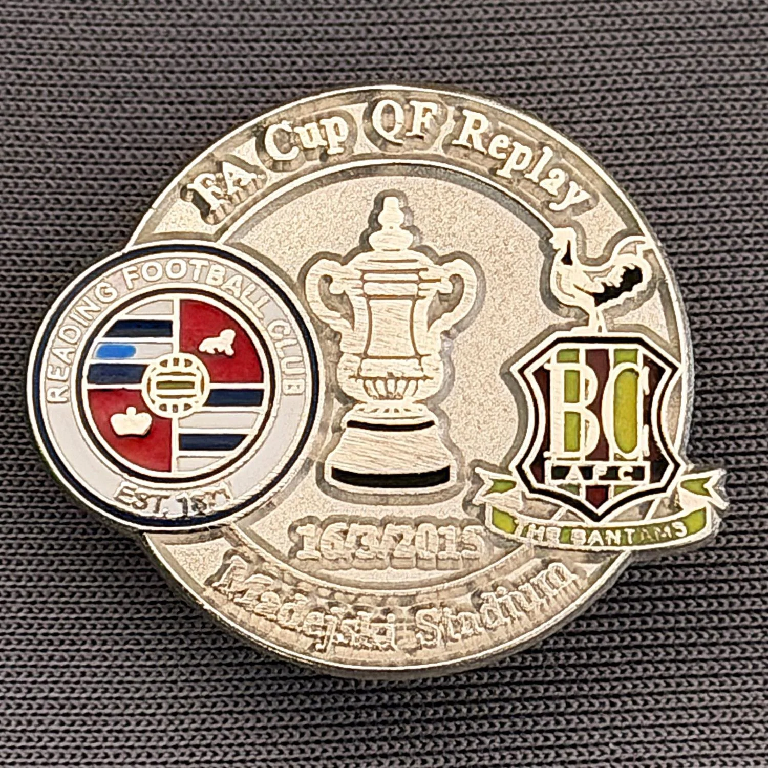 Reference Number: BCFAC132
Size: H 21.9 mm x W 26 mm
Pin Type: Metal Clutch
Plating: Silver
Value: £4
Manufacturer: Dan Lloyd
Comments: F.A. Cup Quarter Final Replay 2014/15, Away v Reading, Silver Version