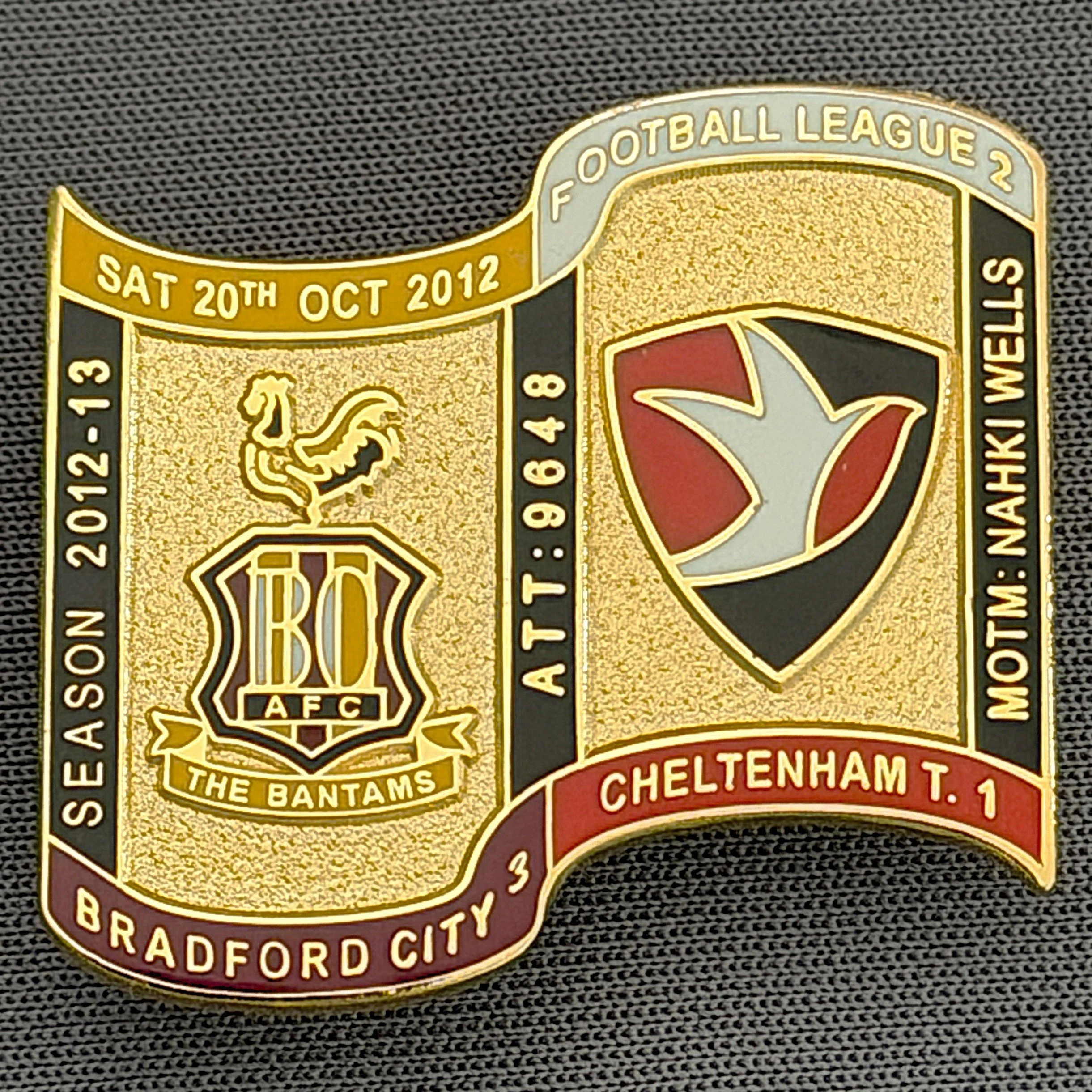 Reference Number: BCFIX122
Size: H 26.9 mm x W 29.2 mm
Pin Type: Brooch Pin
Plating: Gold
Value: £8
Manufacturer: Bradford City Badges
Comments: Bradford City v Cheltenham Town 2012/13 Limited Edition 65 Badges