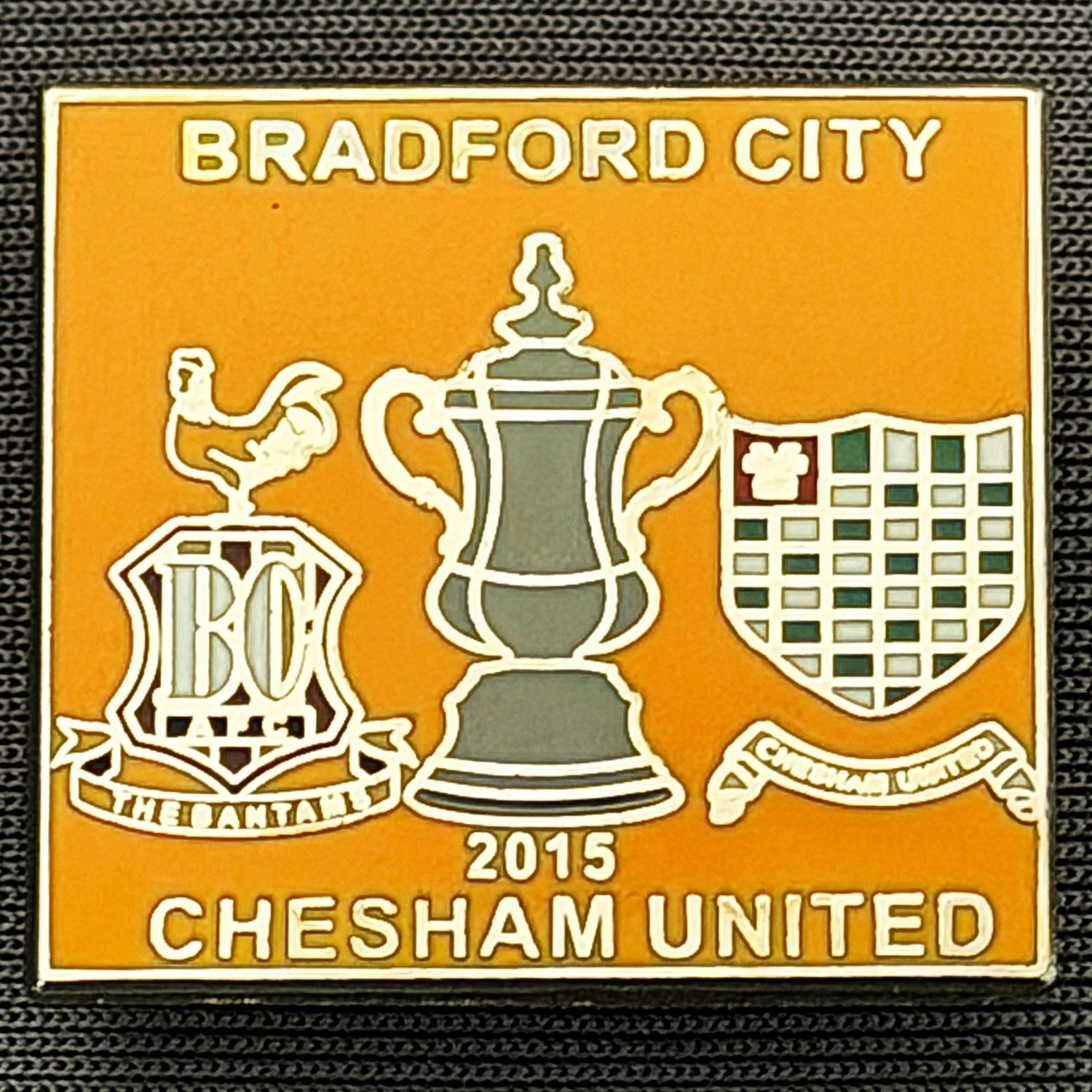 Reference Number: BCFAC152
Size: H 22.9 mm x W 24.9 mm
Pin Type: Brooch Pin
Plating: Silver
Value: £4
Manufacturer: Unknown
Comments: F.A. Cup Second Round 2015/16 v Chesham United, Amber Version