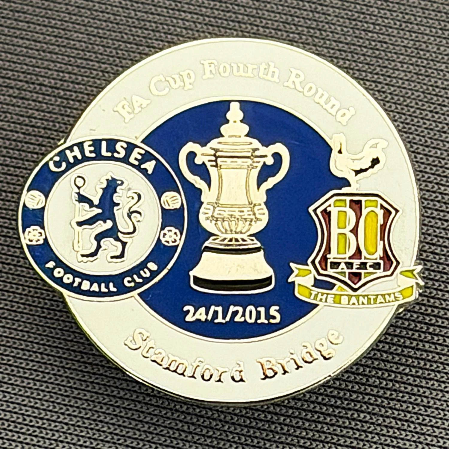 Reference Number: BCFAC093
Size: H 23.3 mm x W 25.3 mm
Pin Type: Metal Clutch
Plating: Silver
Value: £4
Manufacturer: Dan Lloyd
Comments: F.A. Cup Fourth Round 2014/15, Away v Chelsea, White & Blue Version