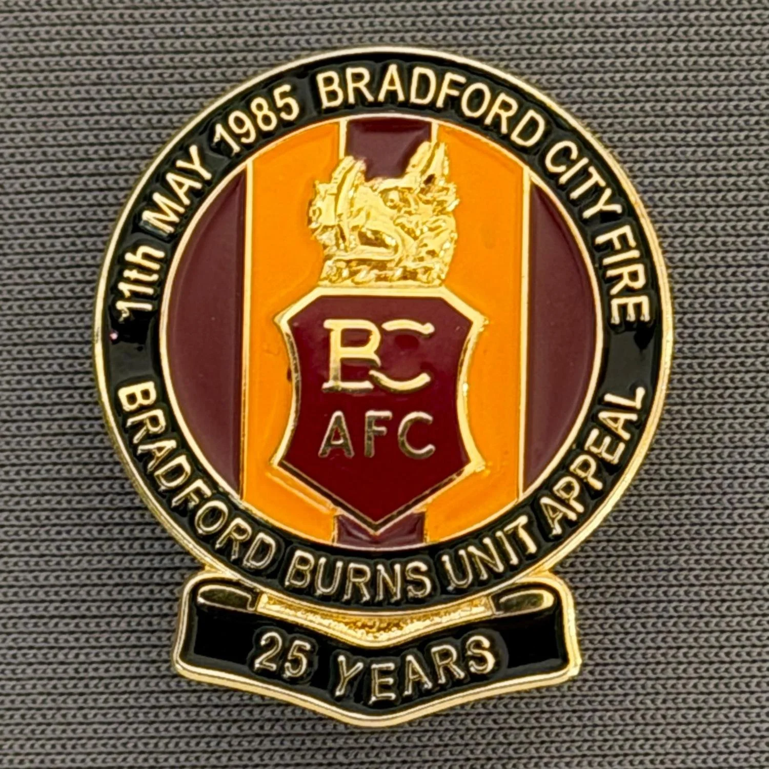 Reference Number: BCFIR003
Size: H 26 mm x W 22 mm
Pin Type: Metal Clutch
Plating: Gold
Value: £10
Manufacturer: Bradford City Badges
Comments: Limited Edition of 250. Claret Version. Sold as set of 3. One sold on eBay June 2026 for £23.04
