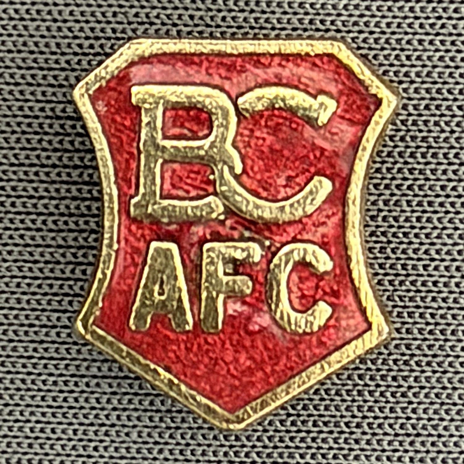 Reference Number: BCBCFC012
Size: H 14.4 mm x W 12 mm
Pin Type: Brooch Pin
Plating: Gold
Value: £8
Manufacturer: Unknown
Comments: Claret BCAFC Shield
