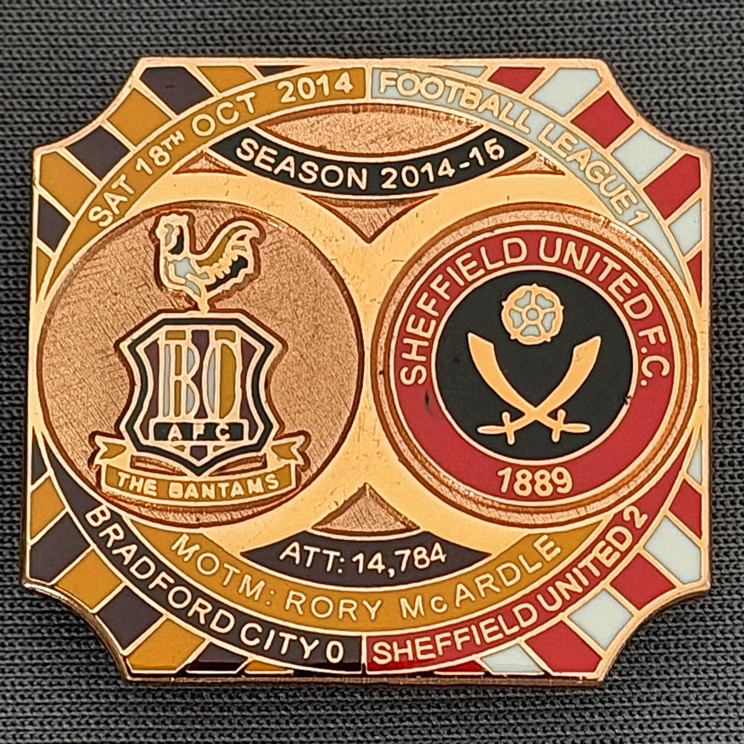 Reference Number: BCFIX306
Size: H 26.8 mm x W 28.8 mm
Pin Type: Brooch Pin
Plating: Copper
Value: £12
Manufacturer: Bradford City Badges
Comments: Bradford City v Sheffield United 2014/15, Limited Edition of 1 Badge (Copper Version)