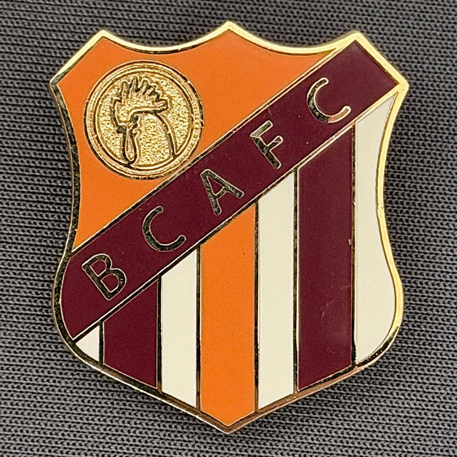 Reference Number: BCBAN018
Size: H 28.2 mm x W 24.7 mm
Pin Type: Brooch Pin
Plating: Gold
Value: £8
Manufacturer: Paraders
Comments: Amber, Claret & White Bantam Shield