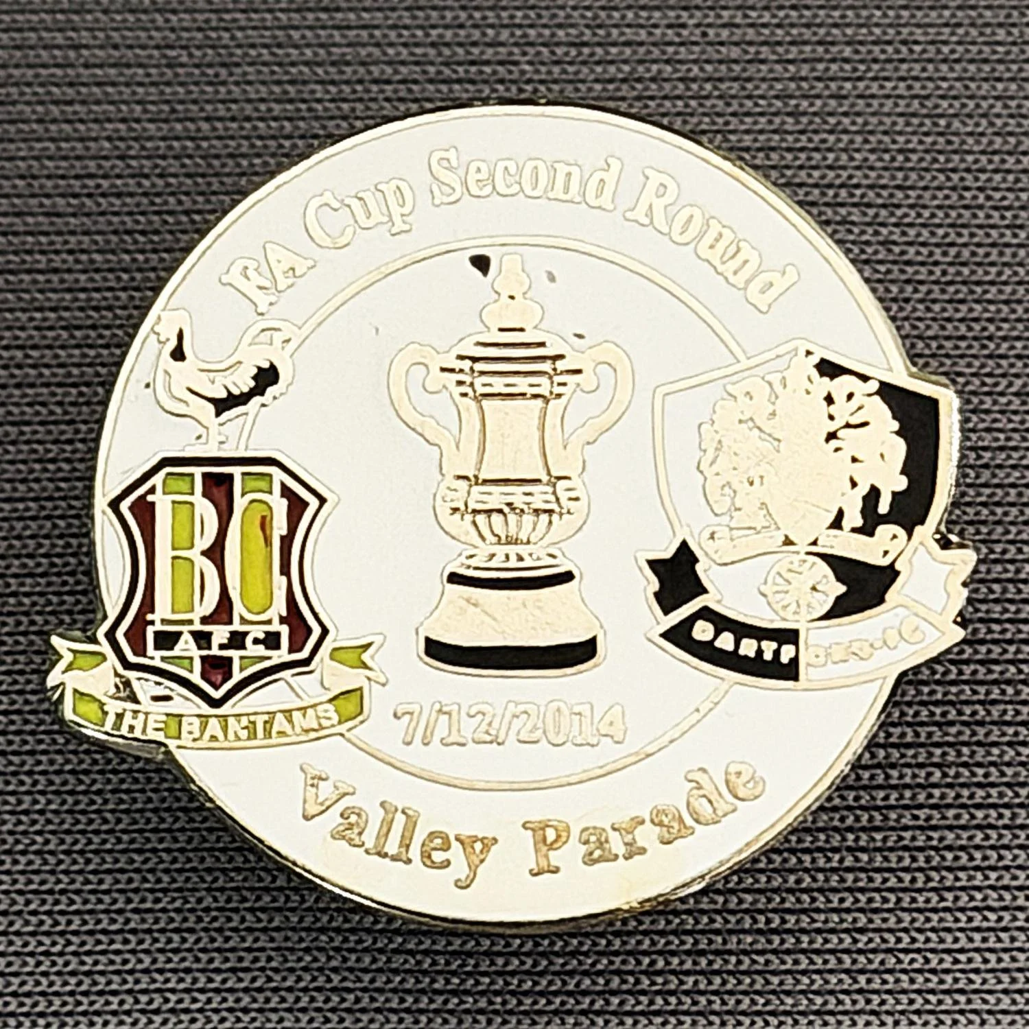 Reference Number: BCFAC071
Size: H 23.3 mm x W 25.6 mm
Pin Type: Metal Clutch
Plating: Silver
Value: £4
Manufacturer: Dan Lloyd
Comments: F.A. Cup Second Round 2014/15, v Dartford, White Version