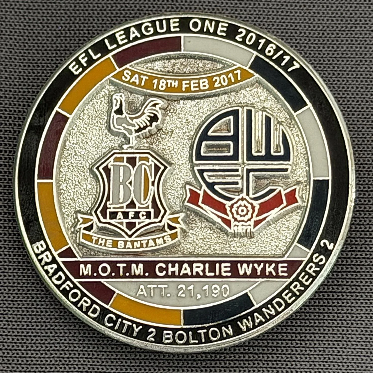 Reference Number: BCFIX408
Size: D 29.4 mm
Pin Type: Brooch Pin
Plating: Nickel
Value: £10
Manufacturer: Bradford City Badges
Comments: Bradford City v Bolton Wanderers 2016/17, Limited Edition of 10 Badges (Nickel Version)