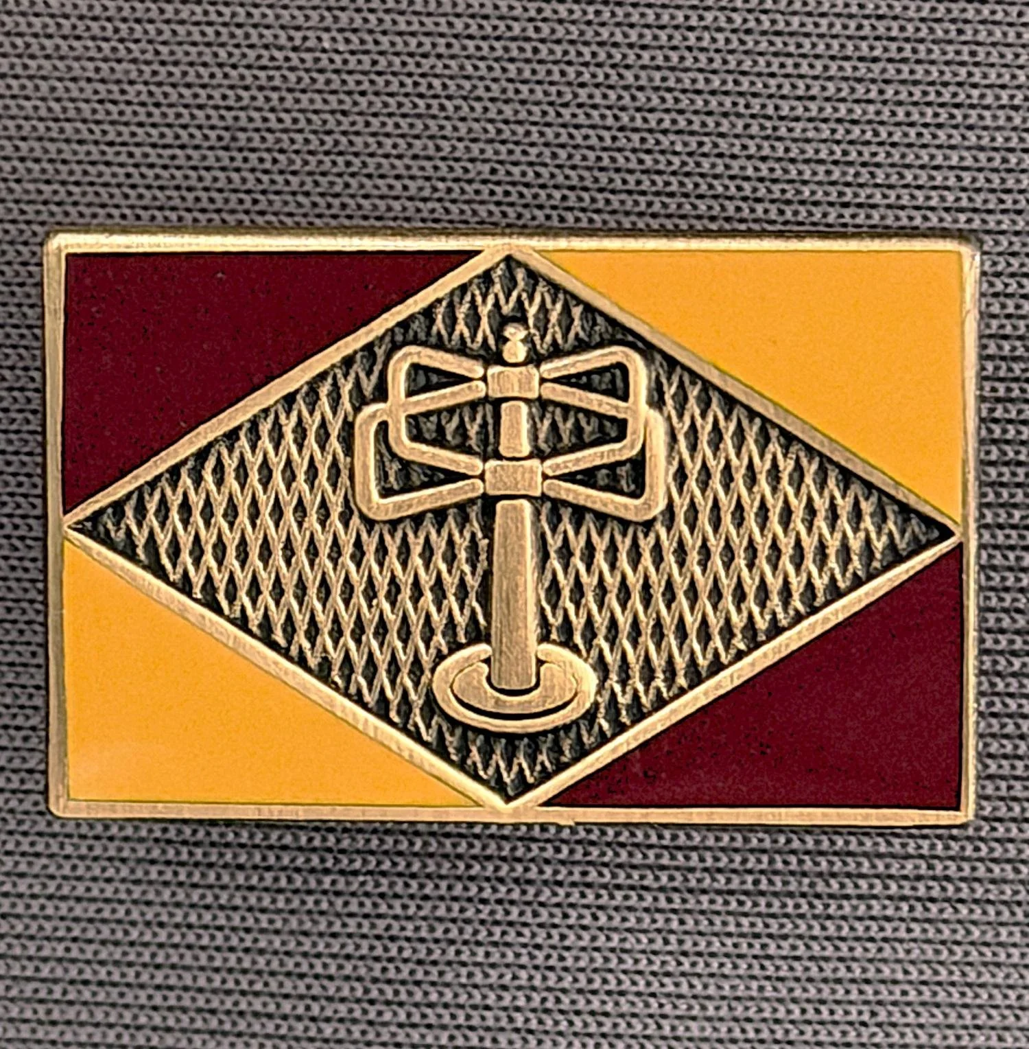 Reference Number: BCUN056
Size: H 20.5 mm x W 32 mm
Pin Type: Brooch Pin
Plating: Antique Bronze
Value: £6
Manufacturer: Bradford City Badges
Comments: Claret & Amber Turnstylewear Badge