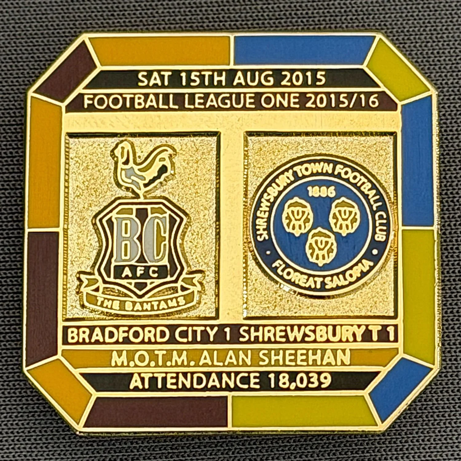 Reference Number: BCFIX323
Size: H 29.8 mm x W 29.8 mm
Pin Type: Brooch Pin
Plating: Gold
Value: £8
Manufacturer: Bradford City Badges
Comments: Bradford City v Shrewsbury Town 2015/16, Limited Edition of 50 Badges (Gold Version)