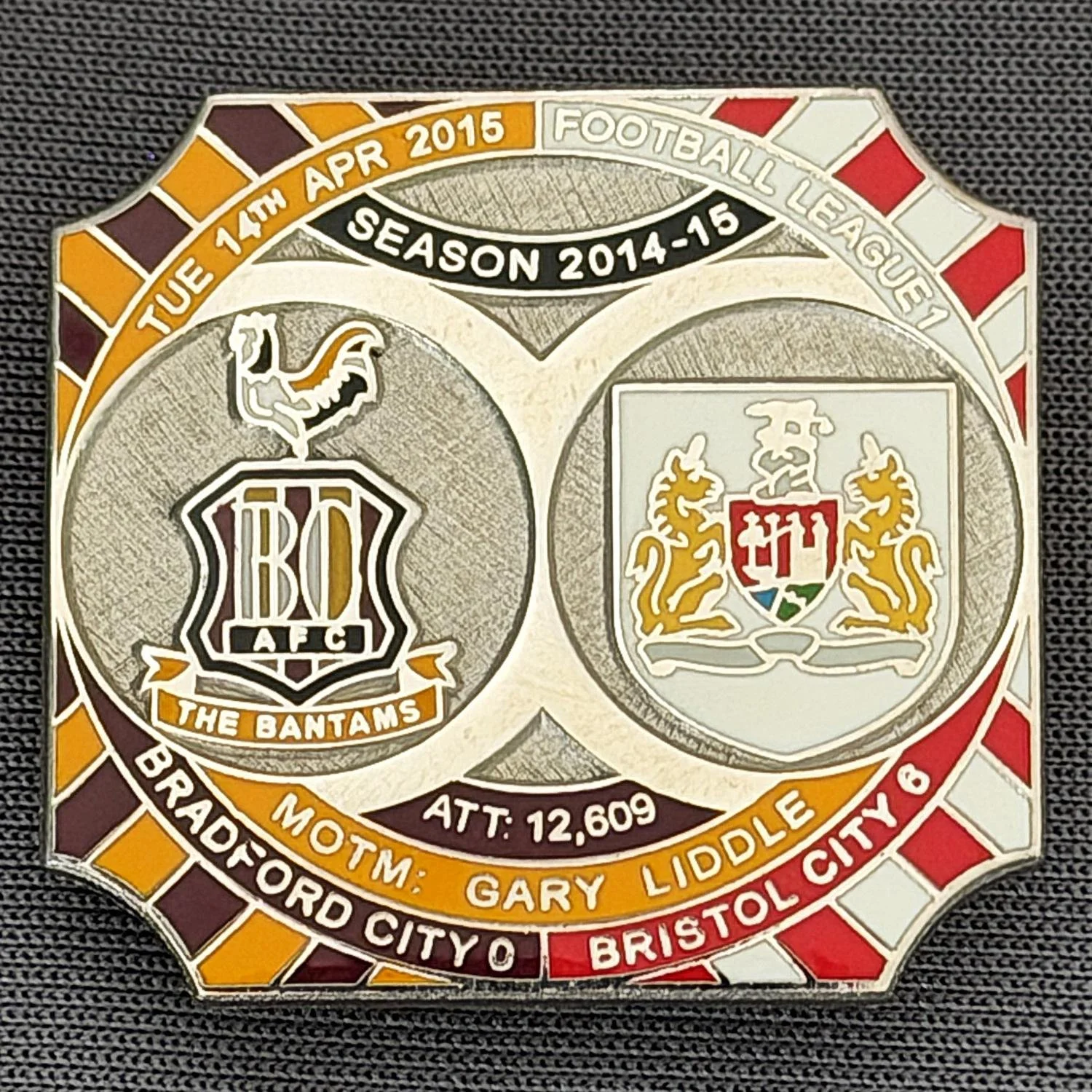 Reference Number: BCFIX298
Size: H 26.8 mm x W 28.8 mm
Pin Type: Brooch Pin
Plating: Nickel
Value: £10
Manufacturer: Bradford City Badges
Comments: Bradford City v Bristol City 2014/15, Limited Edition of 10 Badges (Nickel Version)