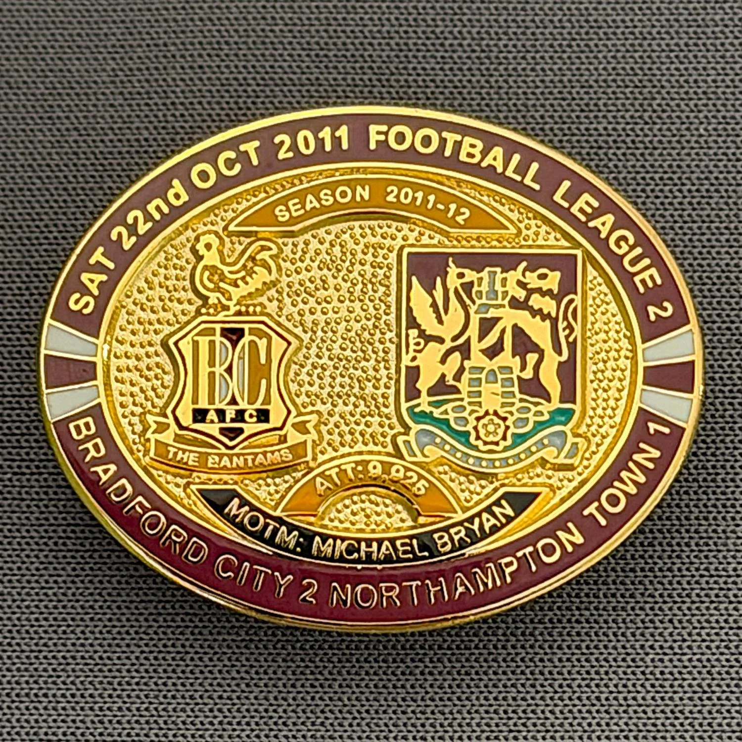 Reference Number: BCFIX076
Size: H 23.6 mm x W 28.7 mm
Pin Type: Brooch Pin
Plating: Gold
Value: £8
Manufacturer: Bradford City Badges
Comments: Bradford City v Northampton Town  2011/12 Limited Edition 80 Badges
