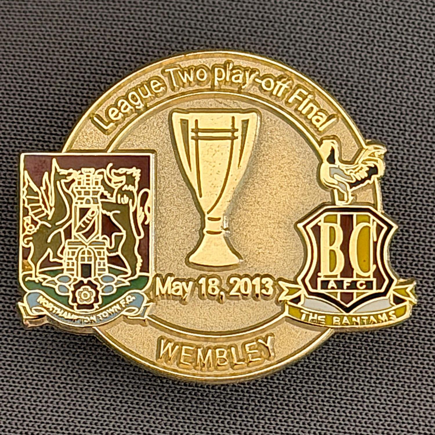 Reference Number: BCOFIX036
Size: H 23.7 mm x W 28.4 mm
Pin Type: Metal Clutch
Plating: Antique Gold
Value: £4
Manufacturer: Dan Lloyd
Comments: League 2 Play Off Final City v Northampton Town 2013, Gold Version