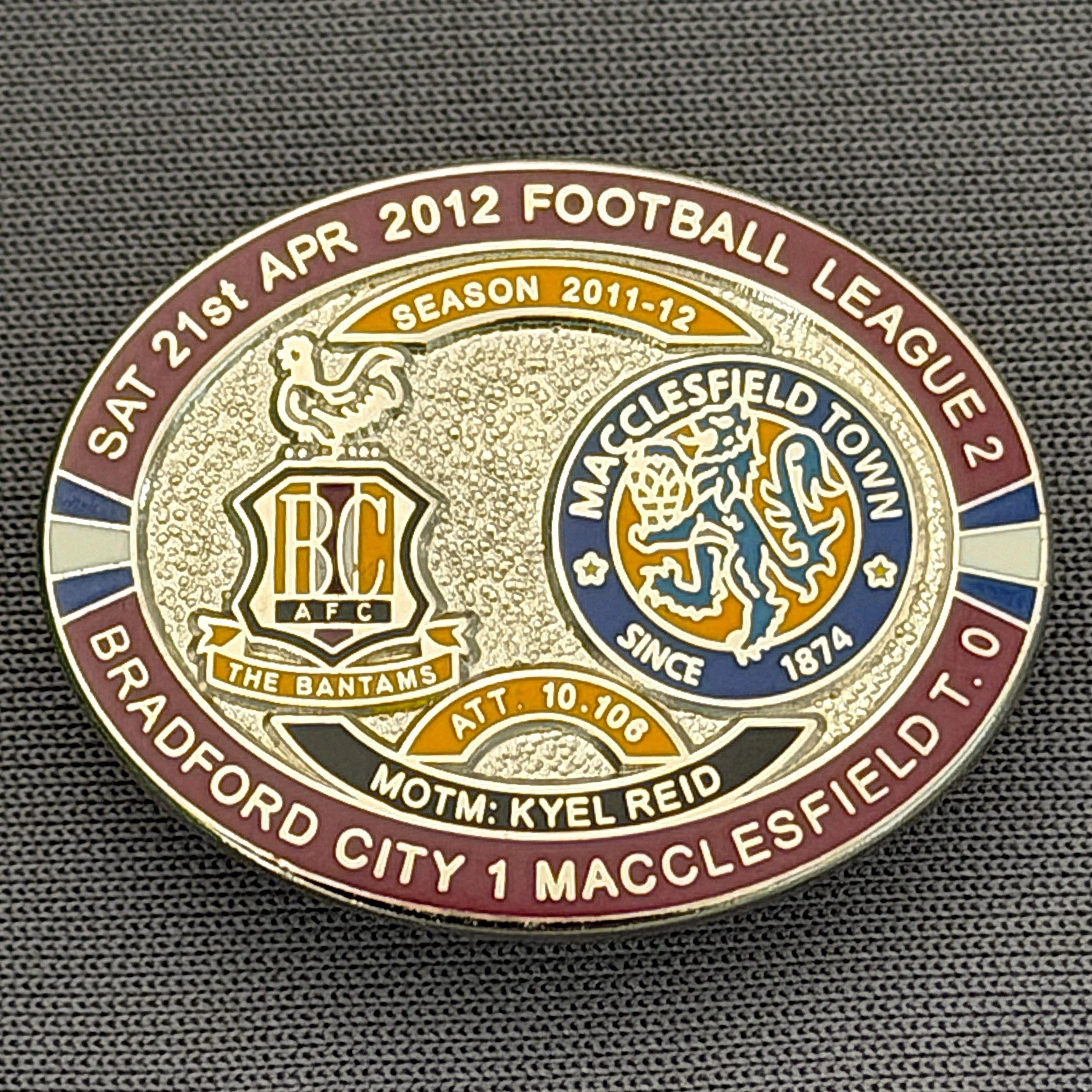 Reference Number: BCFIX114
Size: H 23.6 mm x W 28.7 mm
Pin Type: Brooch Pin
Plating: Silver
Value: £10
Manufacturer: Bradford City Badges
Comments: Bradford City v Macclesfield Town  2011/12 Limited Edition 20 Badges (Silver Version)