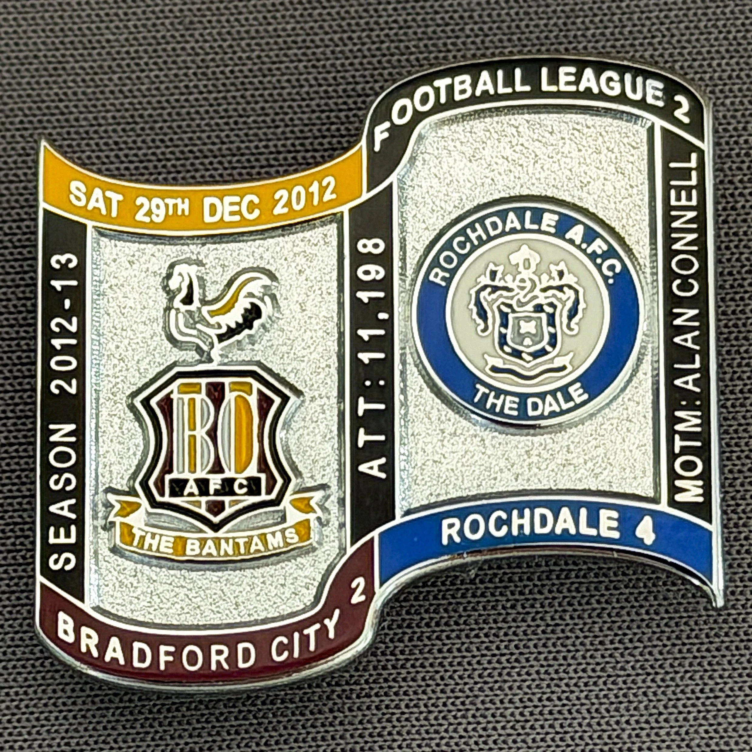 Reference Number: BCFIX151
Size: H 26.9 mm x W 29.2 mm
Pin Type: Brooch Pin
Plating: Chrome
Value: £10
Manufacturer: Bradford City Badges
Comments: Bradford City v Rochdale  2012/13 Limited Edition 10 Badges (Silver Version)