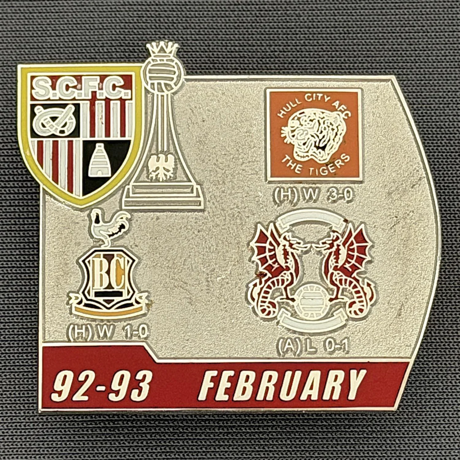 Reference Number: BCOFIX128
Size: H 34.6 mm x W 38.2 mm
Pin Type: Double Metal Clutch
Plating: Silver
Value: £5
Manufacturer: Unknown
Comments: Stoke City v Bradford City & Others 1993, Silver & Red Version 