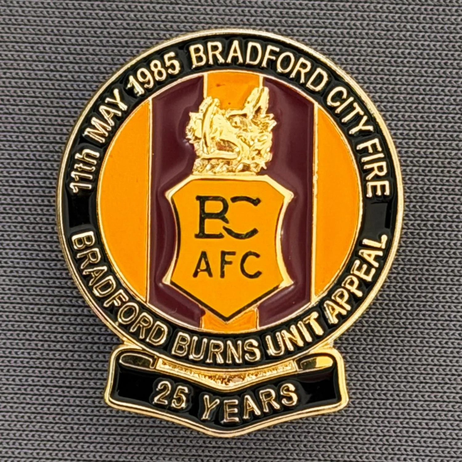 Reference Number: BCFIR002
Size: H 26 mm x W 22 mm
Pin Type: Metal Clutch
Plating: Gold
Value: £10
Manufacturer: Bradford City Badges
Comments: Limited Edition of 250 to raise money for Bradford Burns Unit. Amber Version. Sold as set of 3.
