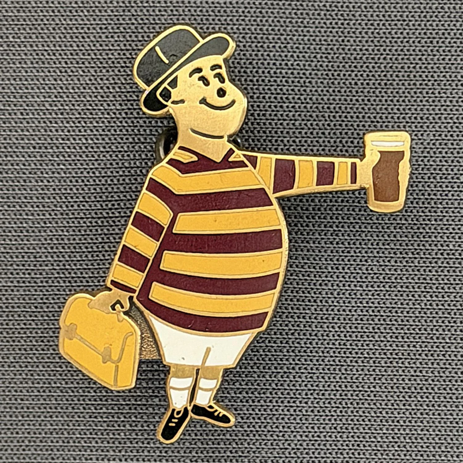 Reference Number: BCGEN097
Size: H 28.8 mm x W 20.9 mm
Pin Type: Brooch Pin
Plating: Antique Bronze
Value: £20
Manufacturer: Bradford City Badges
Comments: City Gent Beer, Amber Briefcase. One Off Badge.