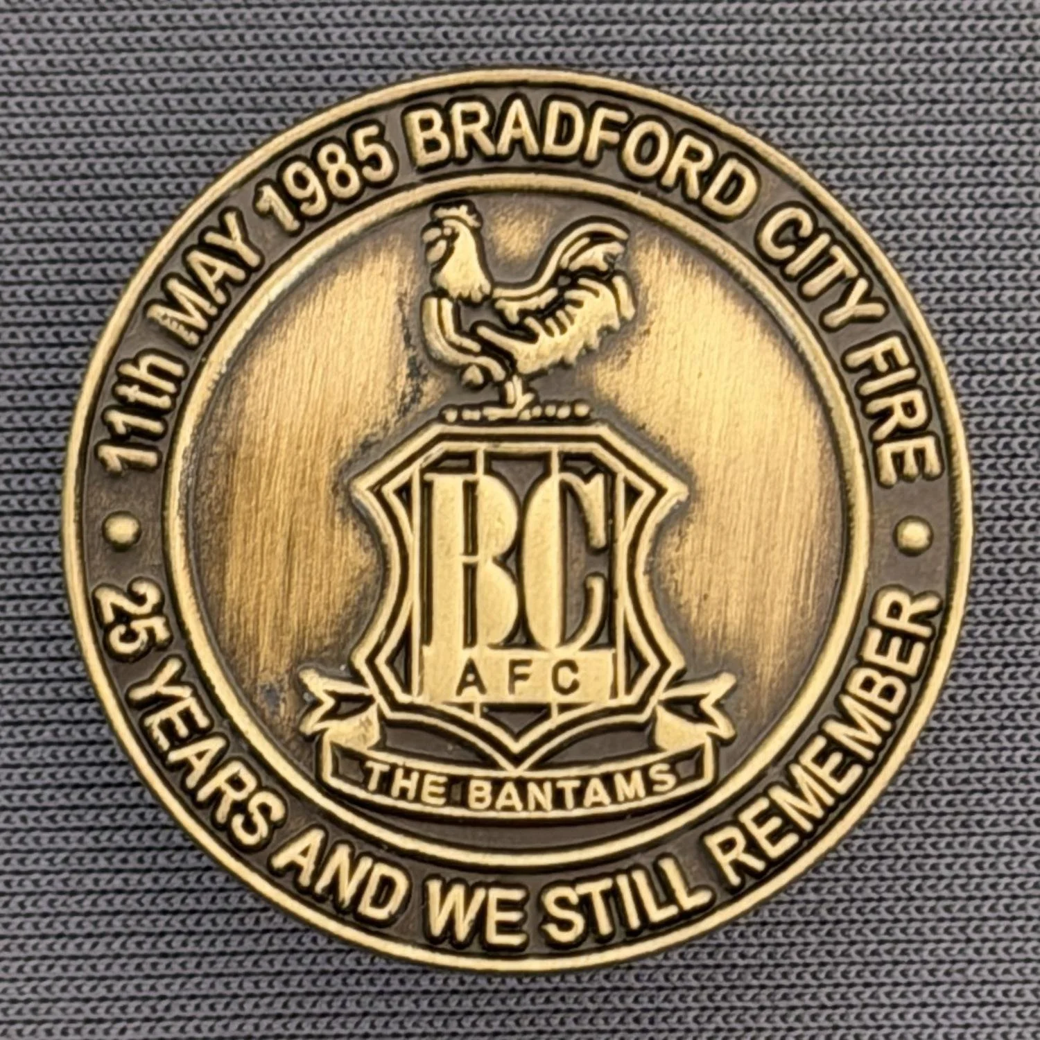 Reference Number: BCFIR007
Size: D 25 mm
Pin Type: Metal Clutch
Plating: Antique Bronze
Value: £12
Manufacturer: Bradford City Badges
Comments: Limited Edition of 56 to raise additional money for Bradford Burns Unit.  Sold as set of 4.