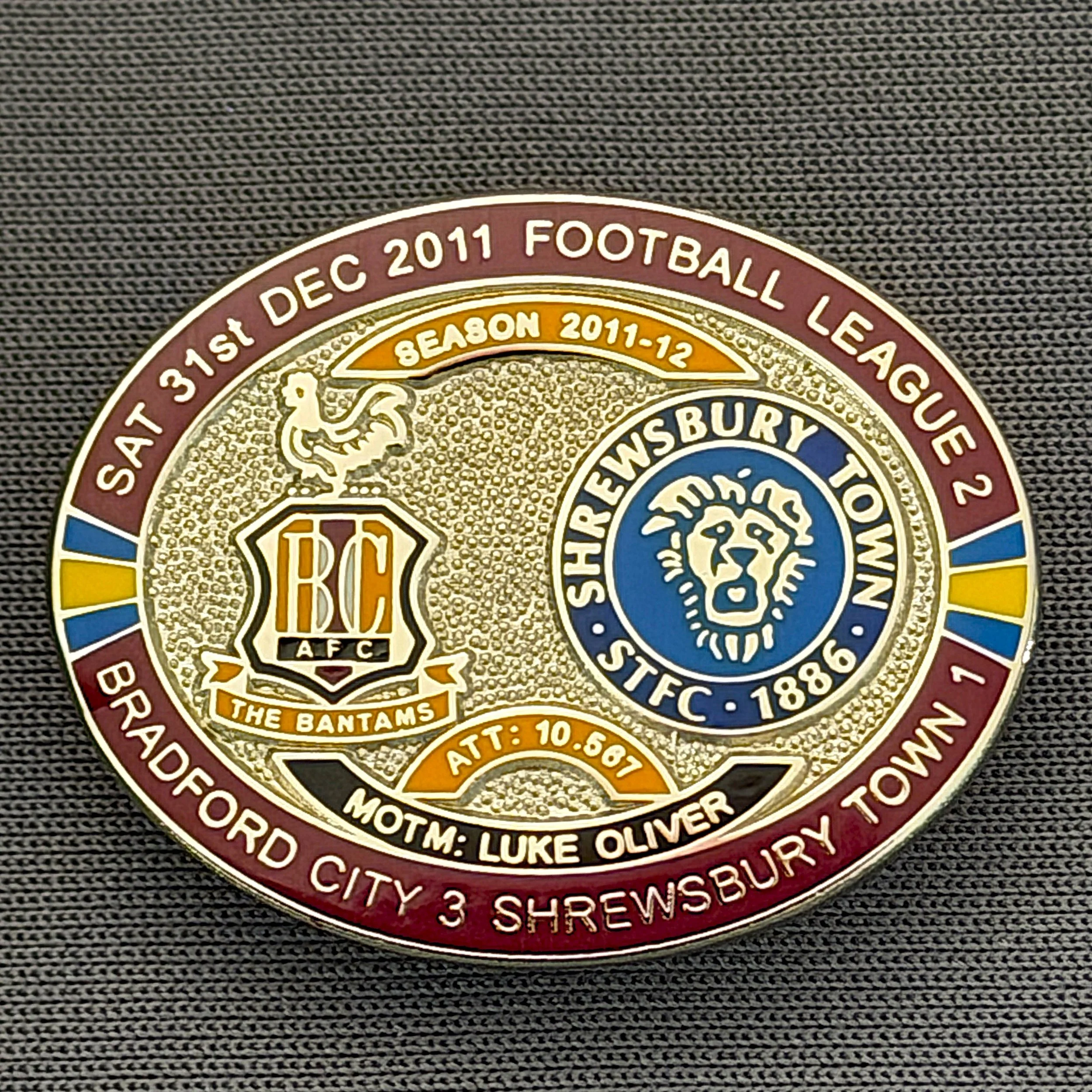 Reference Number: BCFIX104
Size: H 23.6 mm x W 28.7 mm
Pin Type: Brooch Pin
Plating: Silver
Value: £10
Manufacturer: Bradford City Badges
Comments: Bradford City v Shrewsbury Town  2011/12 Limited Edition 20 Badges (Silver Version)