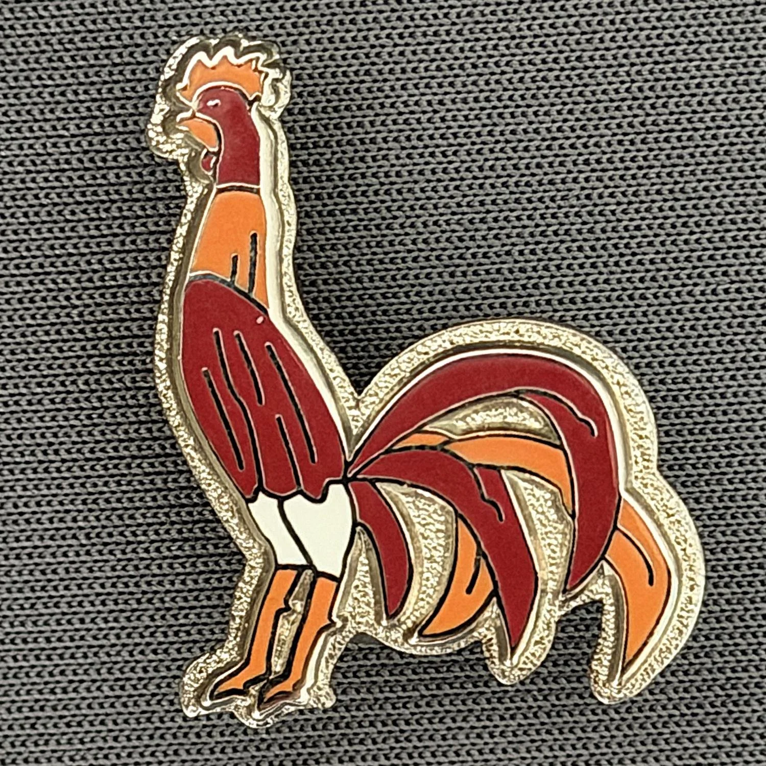 Reference Number: BCBAN028
Size: H 24 mm x W 18.6 mm
Pin Type: Brooch Pin
Plating: Silver
Value: £8
Manufacturer: Paraders
Comments: Claret, Orange & White Bantam Crest