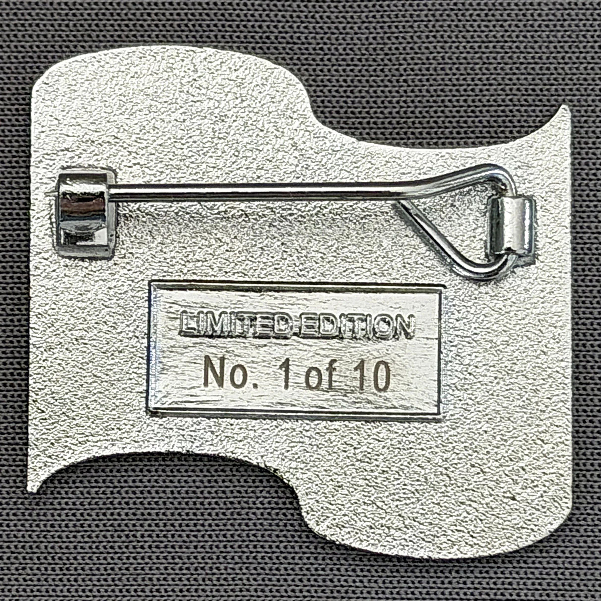 A metal lock with a warning sign indicating a limitation, with the text 'No. 1 of 10' visible on the sign.