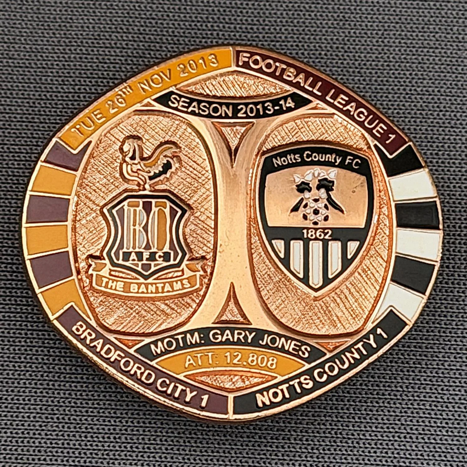 Reference Number: BCFIX239
Size: H 26.3 mm x W 28.9 mm
Pin Type: Brooch Pin
Plating: Copper
Value: £12
Manufacturer: Bradford City Badges
Comments: Bradford City v Notts County 2013/14, Limited Edition of 1 Badge (Copper Version)