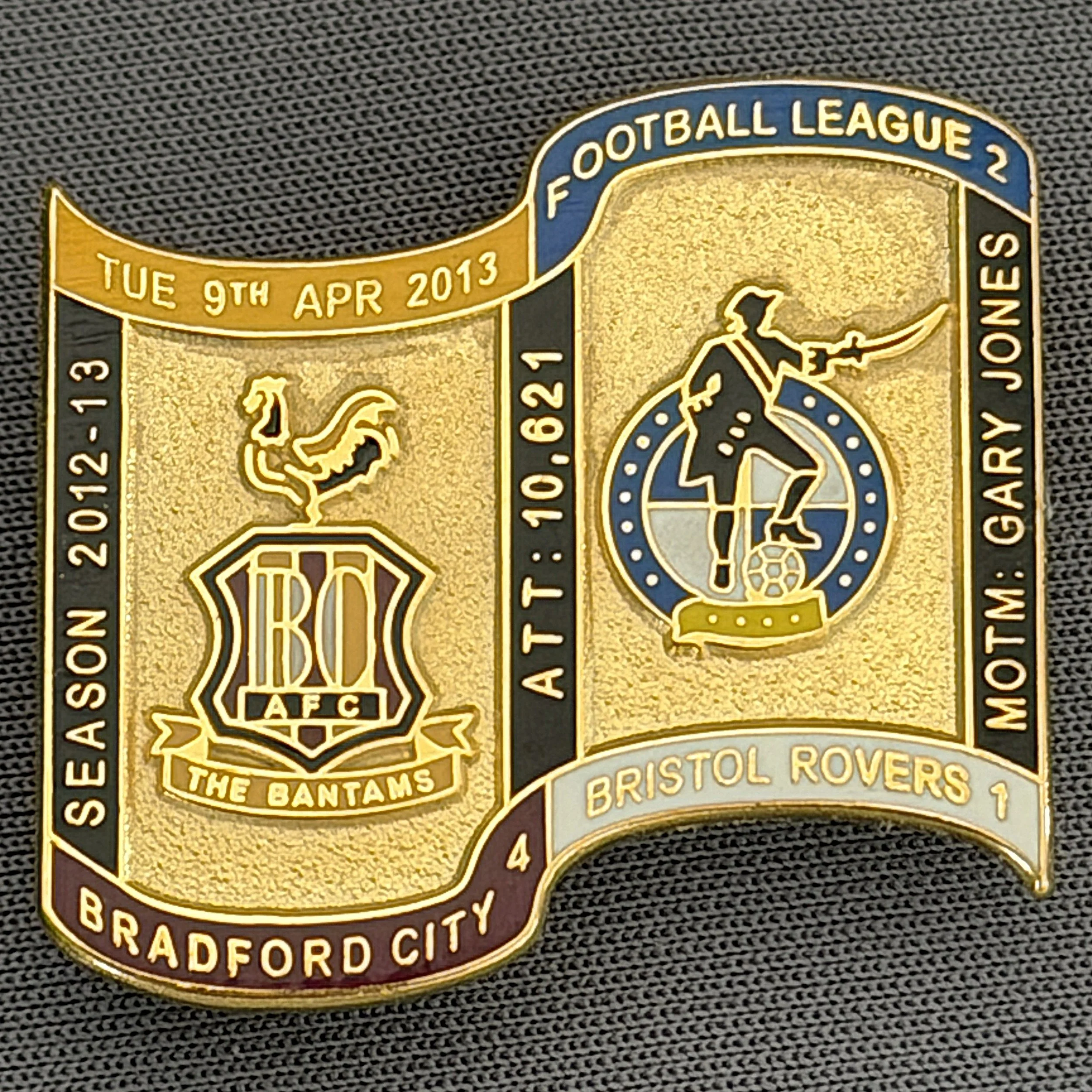 Reference Number: BCFIX136
Size: H 26.9 mm x W 29.2 mm
Pin Type: Brooch Pin
Plating: Gold
Value: £8
Manufacturer: Bradford City Badges
Comments: Bradford City v Bristol Rovers 2012/13 Limited Edition 65 Badges
