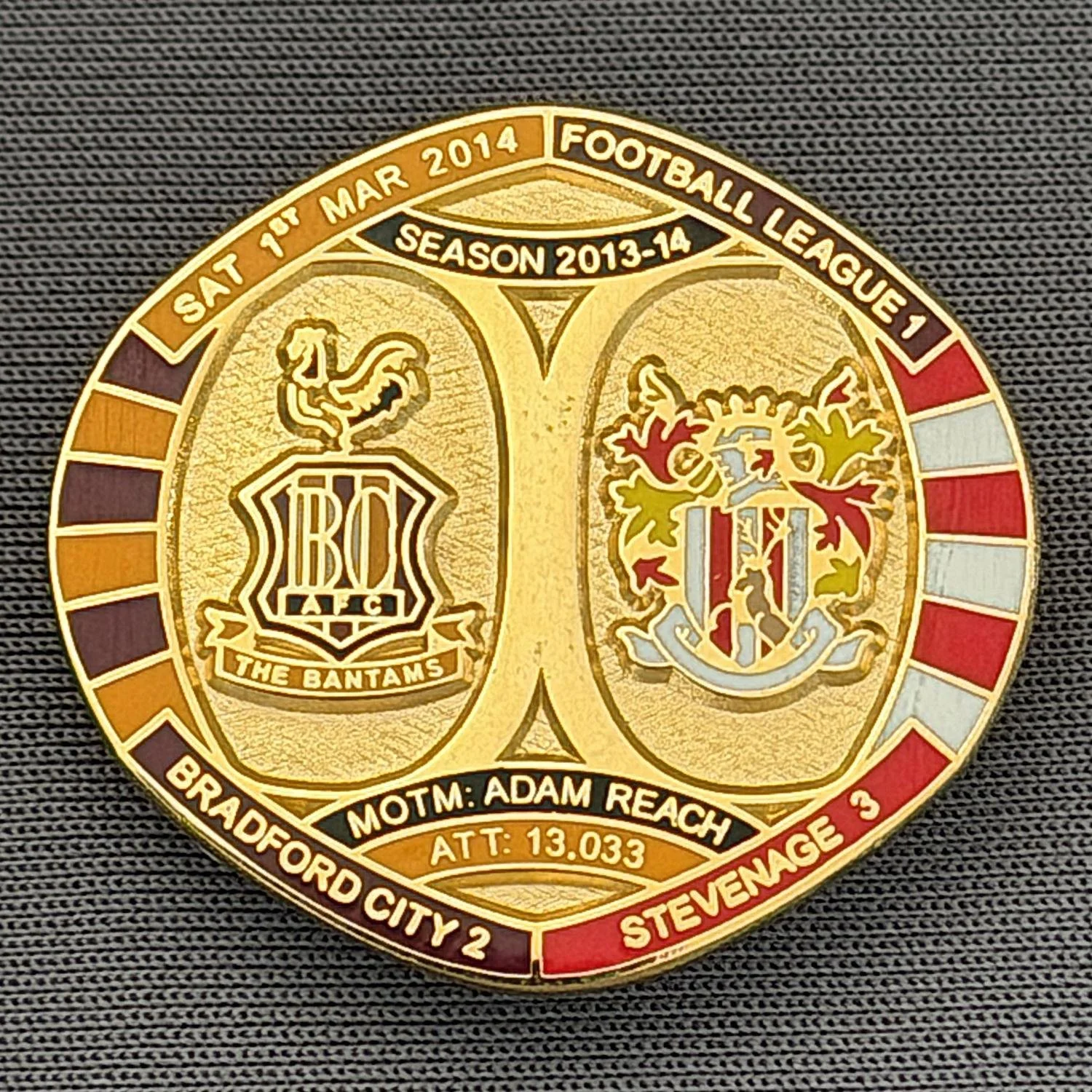 Reference Number: BCFIX202
Size: H 26.3 mm x W 28.9 mm
Pin Type: Brooch Pin
Plating: Gold
Value: £8
Manufacturer: Bradford City Badges
Comments: Bradford City v Stevenage 2013/14 Limited Edition 55 Badges