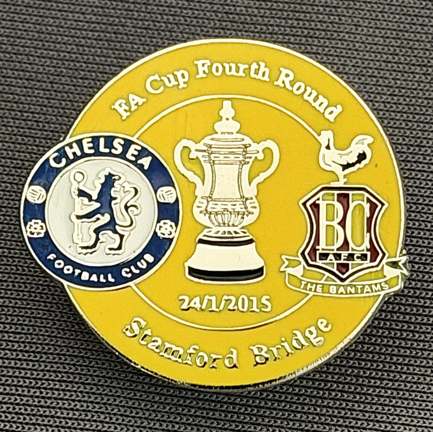 Reference Number: BCFAC088
Size: H 23.3 mm x W 25.3 mm
Pin Type: Metal Clutch
Plating: Silver
Value: £4
Manufacturer: Dan Lloyd
Comments: F.A. Cup Fourth Round 2014/15, Away v Chelsea, Amber Version