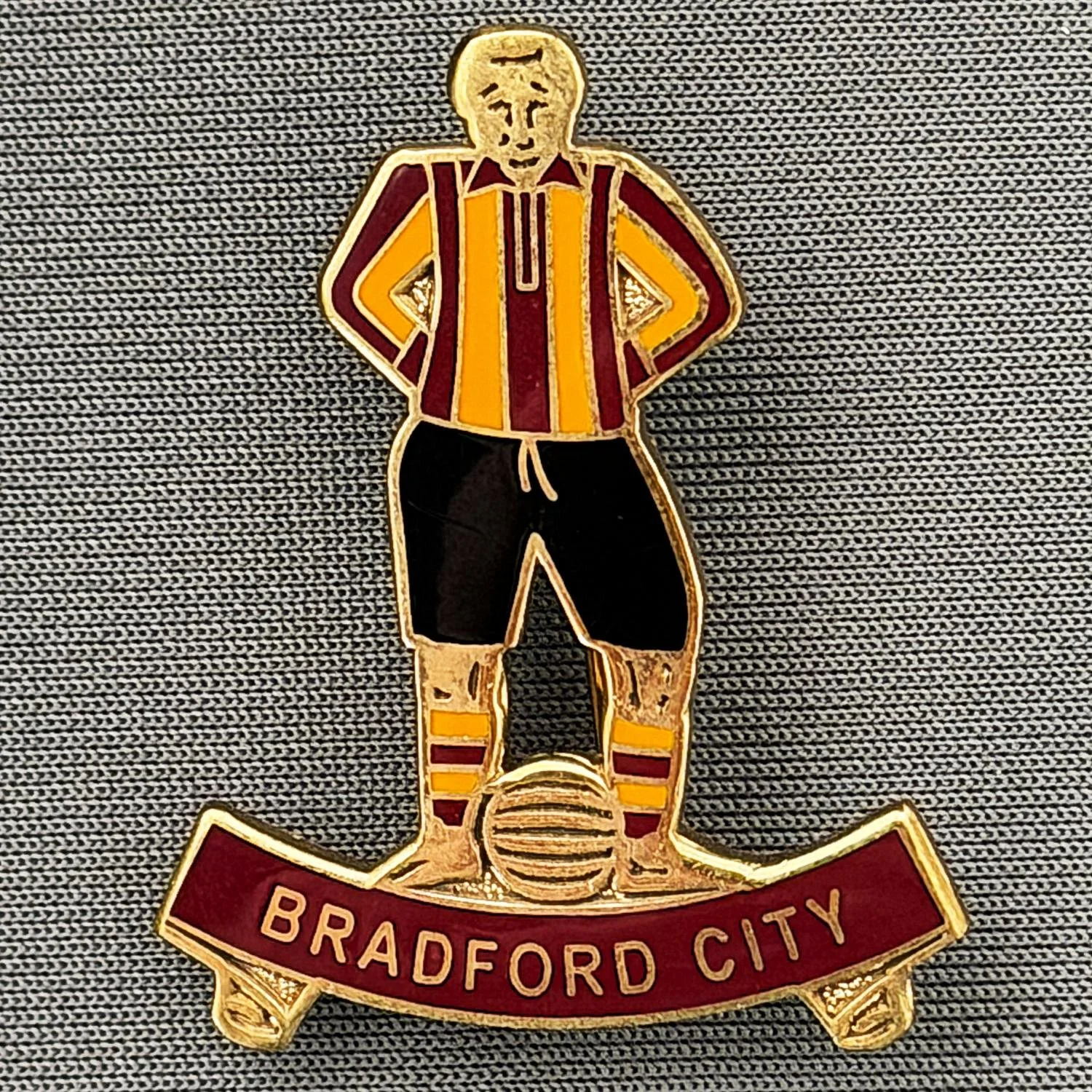 Reference Number: BCKIT078
Size: H 35 mm x W 27.7 mm
Pin Type: Brooch Pin
Plating: Antique Gold
Value: £8
Manufacturer: Retro Pins
Comments: Bradford City Footballer