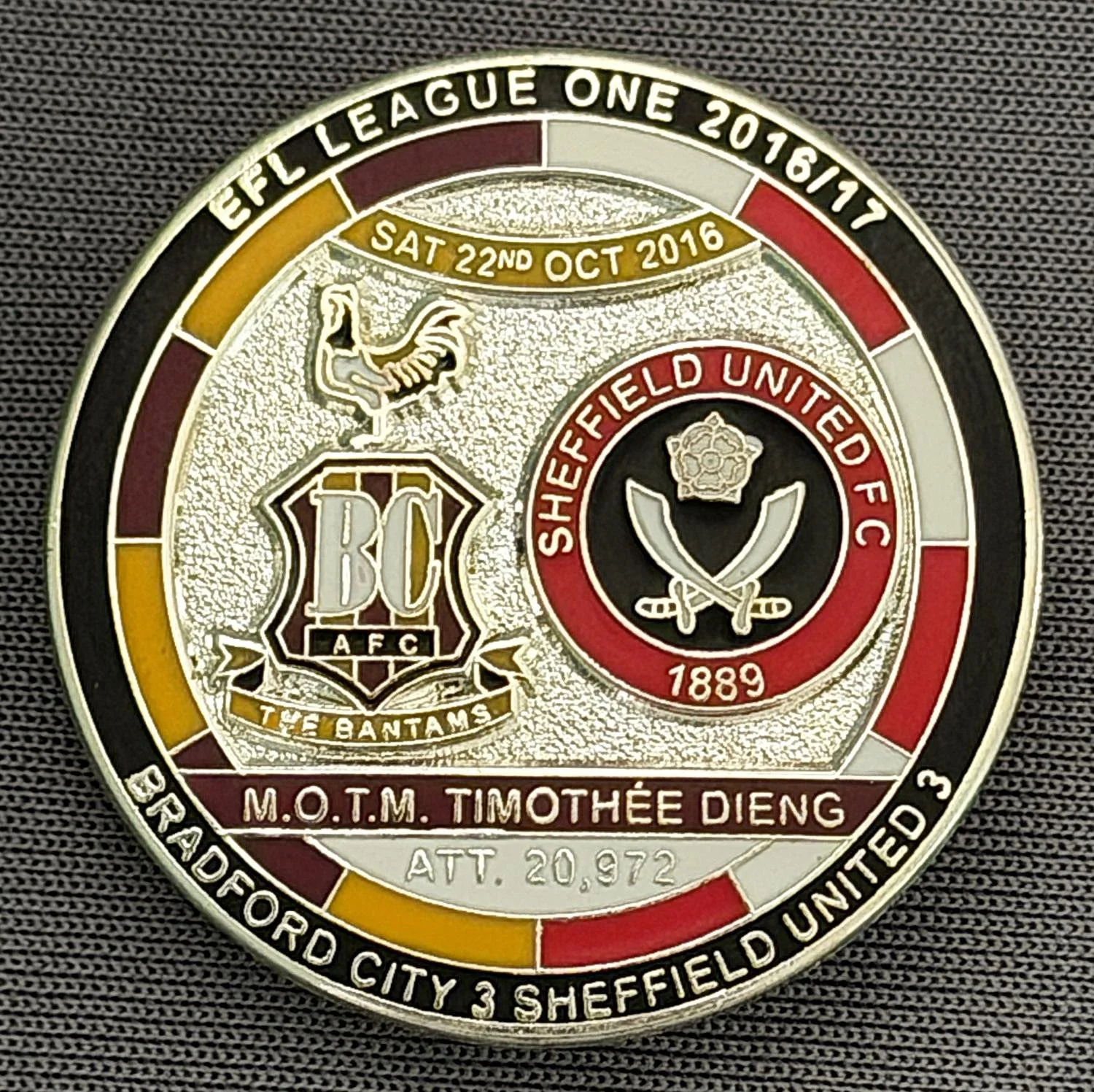 Reference Number: BCFIX399
Size: D 29.4 mm
Pin Type: Brooch Pin
Plating: Nickel
Value: £10
Manufacturer: Bradford City Badges
Comments: Bradford City v Sheffield United 2016/17, Limited Edition of 10 Badges (Nickel Version)