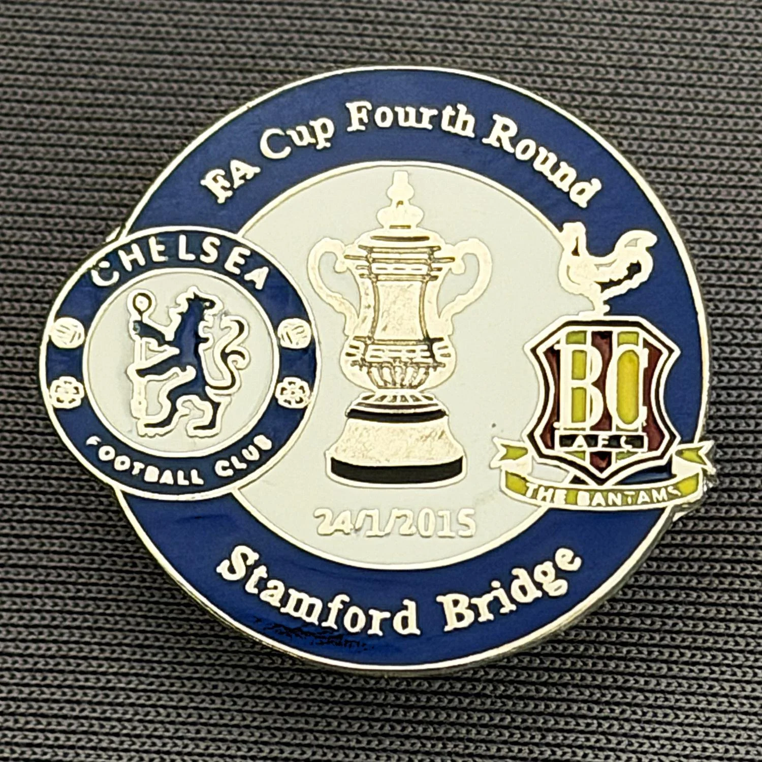 Reference Number: BCFAC090
Size: H 23.3 mm x W 25.3 mm
Pin Type: Metal Clutch
Plating: Silver
Value: £4
Manufacturer: Dan Lloyd
Comments: F.A. Cup Fourth Round 2014/15, Away v Chelsea, Blue & White Version