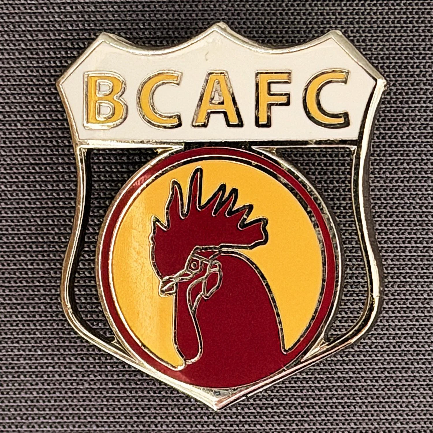 Reference Number: BCBAN023
Size: H 26.2 mm x W 22.9 mm
Pin Type: Brooch Pin
Plating: Silver
Value: £8
Manufacturer: Paraders
Comments: Cut out Bantam Shield