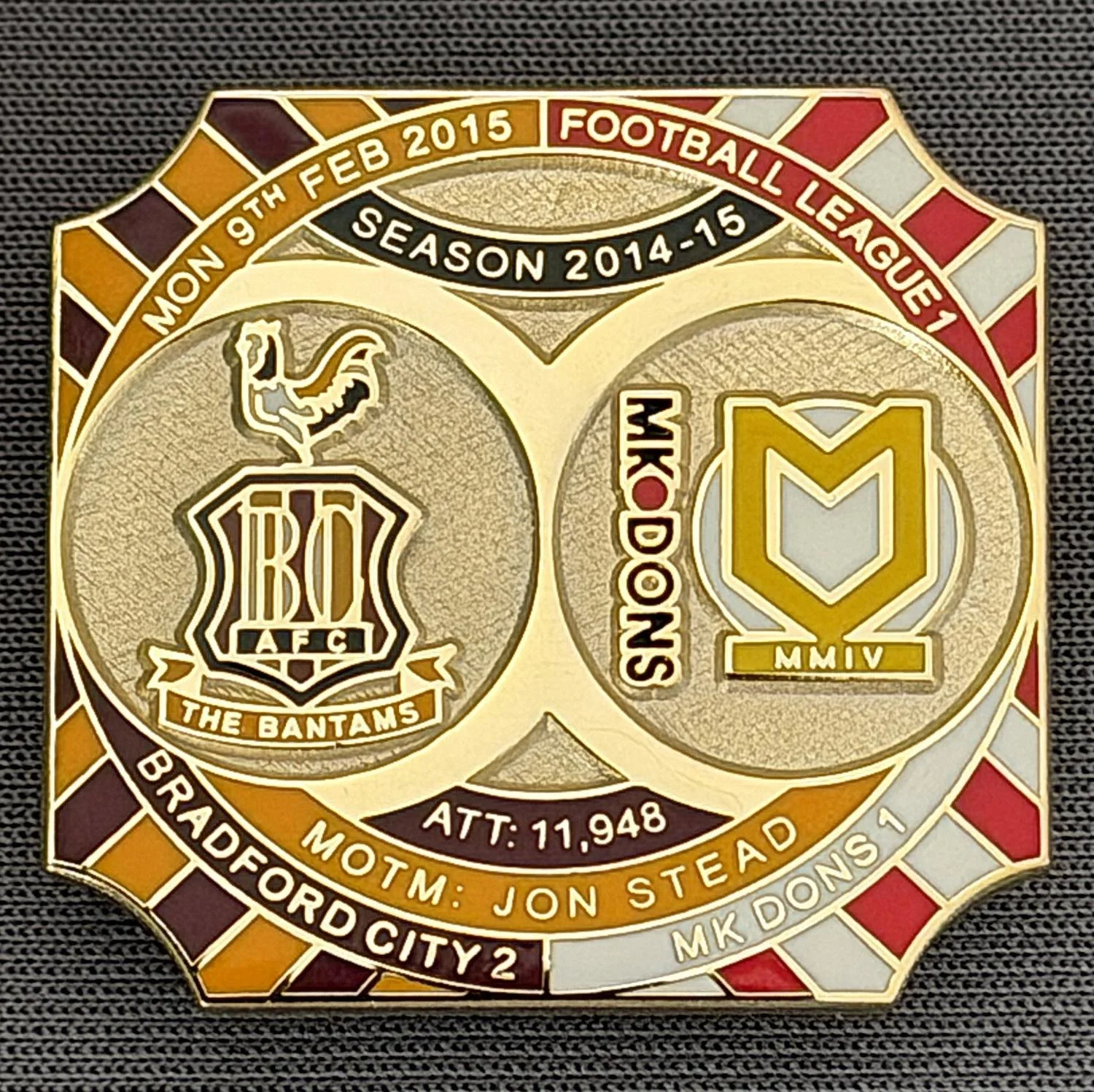 Reference Number: BCFIX268
Size: H 26.8 mm x W 28.8 mm
Pin Type: Brooch Pin
Plating: Gold
Value: £8
Manufacturer: Bradford City Badges
Comments: Bradford City v MK Dons 2014/15, Limited Edition of 50 Badges (Gold Version)