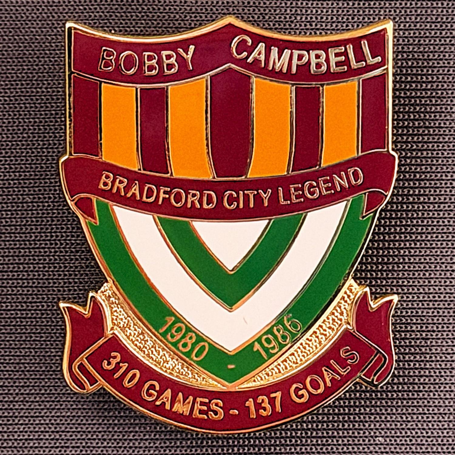Reference Number: BCUN014
Size: H 32 mm x W 25.9 mm
Pin Type: Metal Clutch
Plating: Gold
Value: £10
Manufacturer: Bradford City Badges
Comments: Bobby Campbell Limited Edition of 25. Boxed Set of 4. Issued 2012. Claret, Amber, Green & White Version.