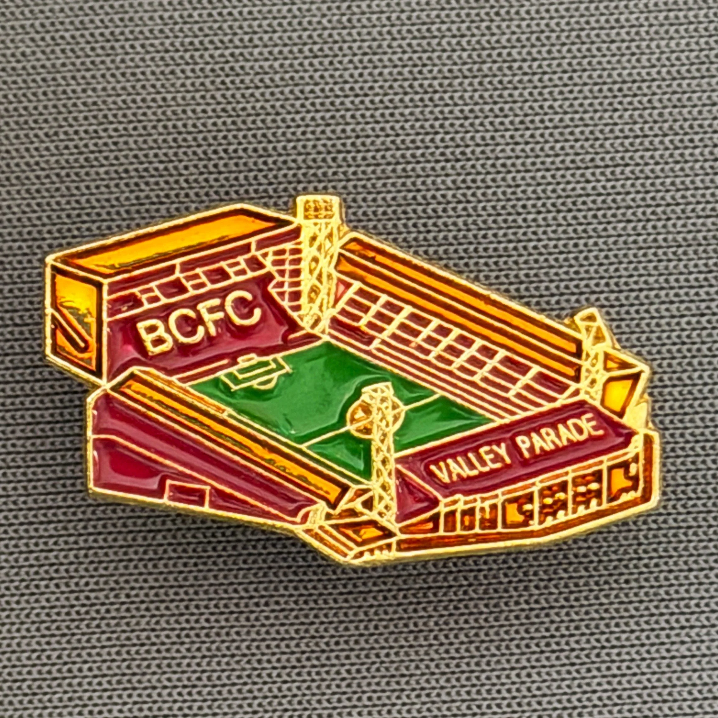 Reference Number: BCVP008
Size: H 15.2 mm x W 26.9 mm
Pin Type: Brooch Pin
Plating: Gold
Value: £8
Manufacturer: Unknown
Comments: Valley Parade Ground with BCFC