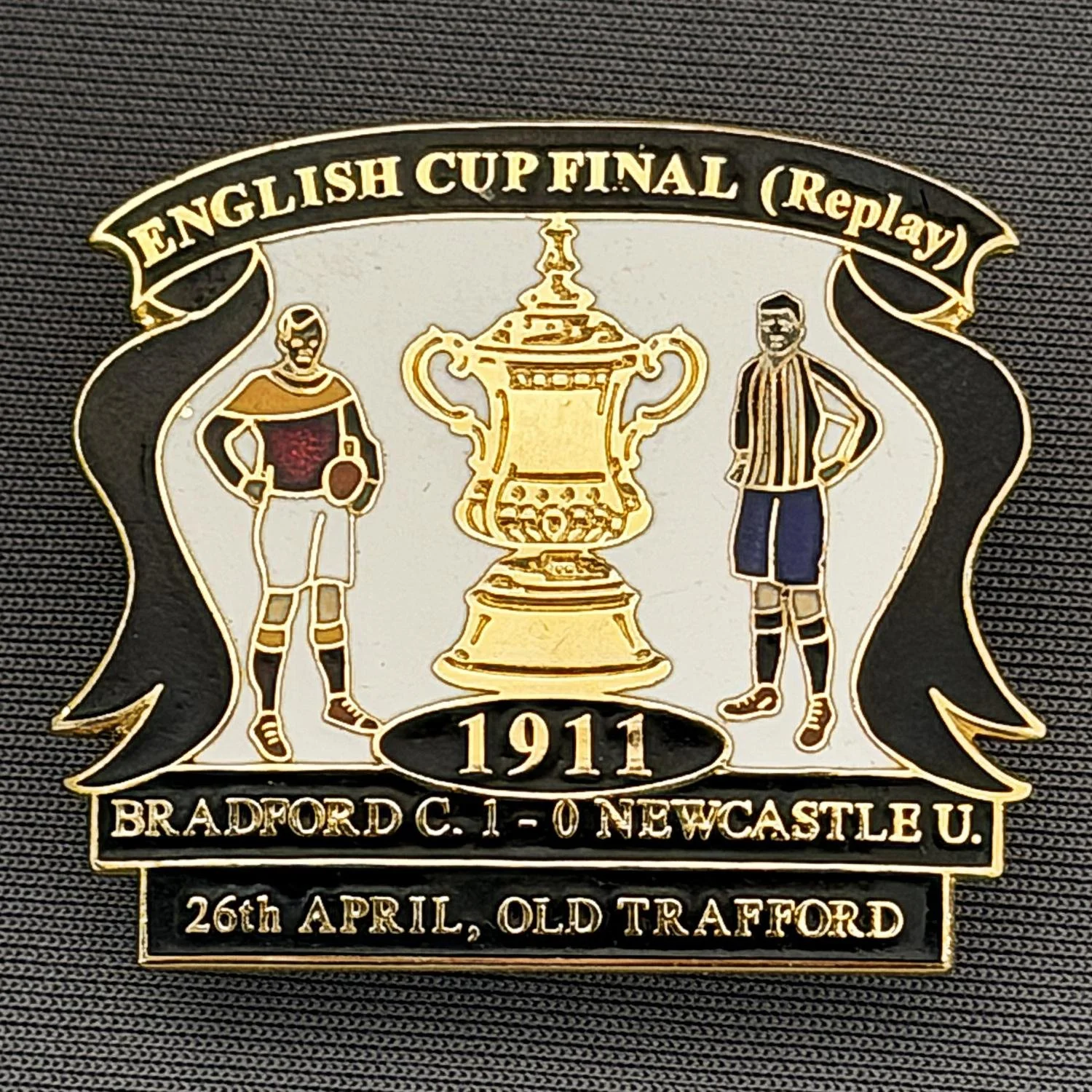Reference Number: BCFAC002
Size: H 32.5 mm x W 37.6 mm
Pin Type: Double Metal Clutch
Plating: Gold
Value: £15
Manufacturer: Not Known
Comments: 1911 F.A. Cup Final Victory v Newcastle, Black & White Version, Limited Edition of 50
