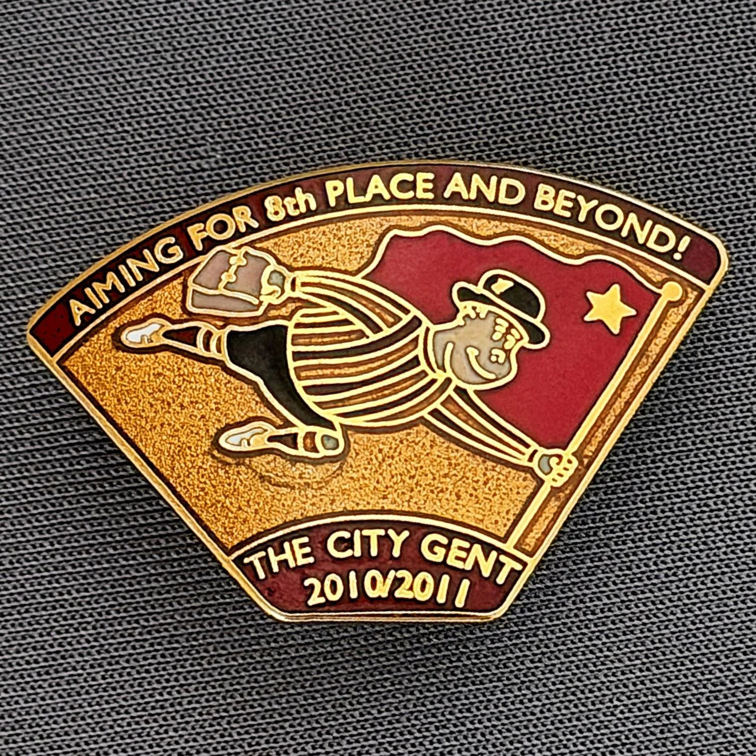 Reference Number: BCGEN044
Size: H 21.7 mm x W32.4 mm
Pin Type: Brooch Pin
Plating: Gold
Value: £8
Manufacturer: Bradford City Badges
Comments: City Gent Magazine 2010/11 Badge, Limited Edition of 200