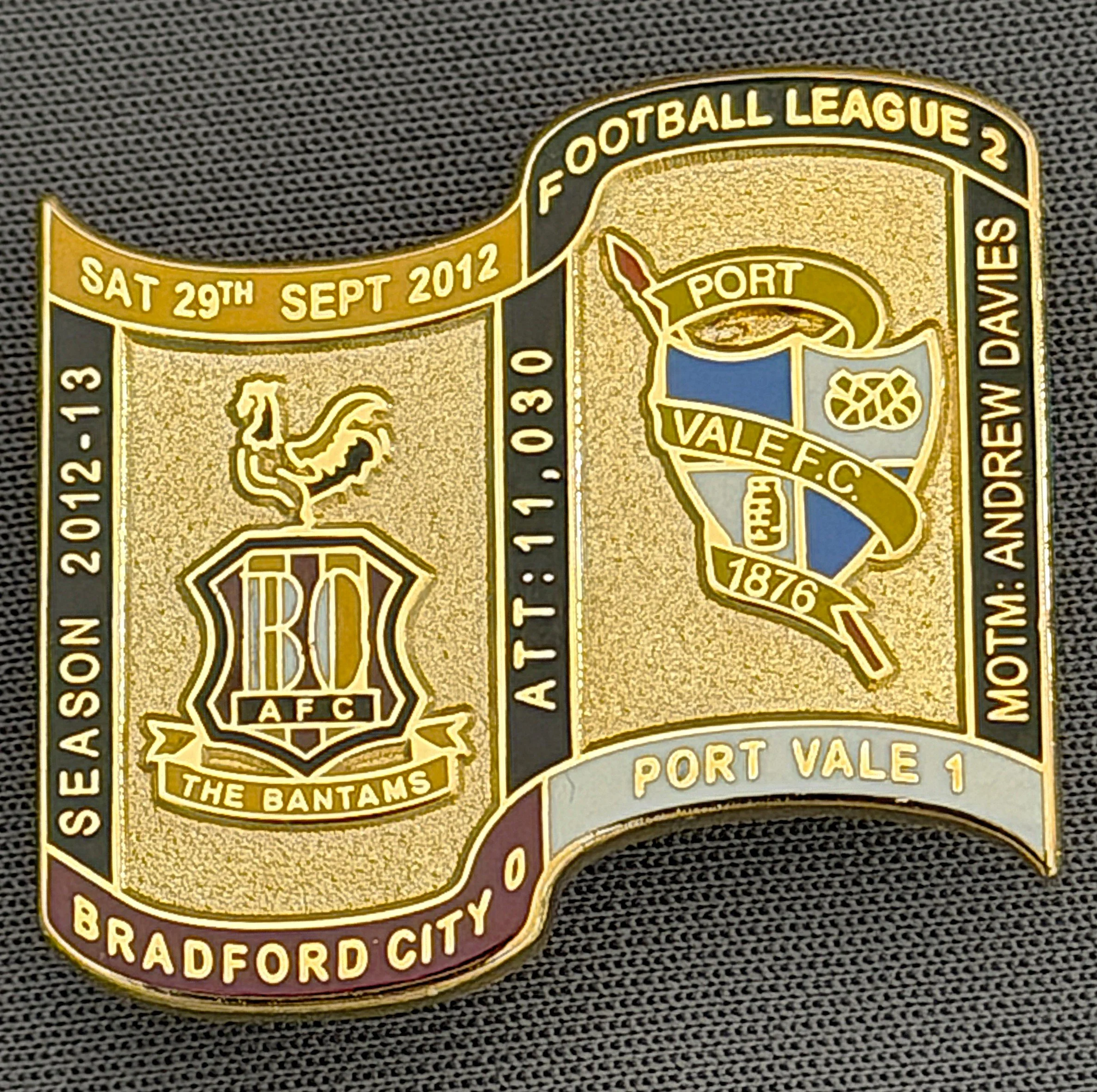 Reference Number: BCFIX120
Size: H 26.9 mm x W 29.2 mm
Pin Type: Brooch Pin
Plating: Gold
Value: £8
Manufacturer: Bradford City Badges
Comments: Bradford City v Port Vale 2012/13 Limited Edition 65 Badges