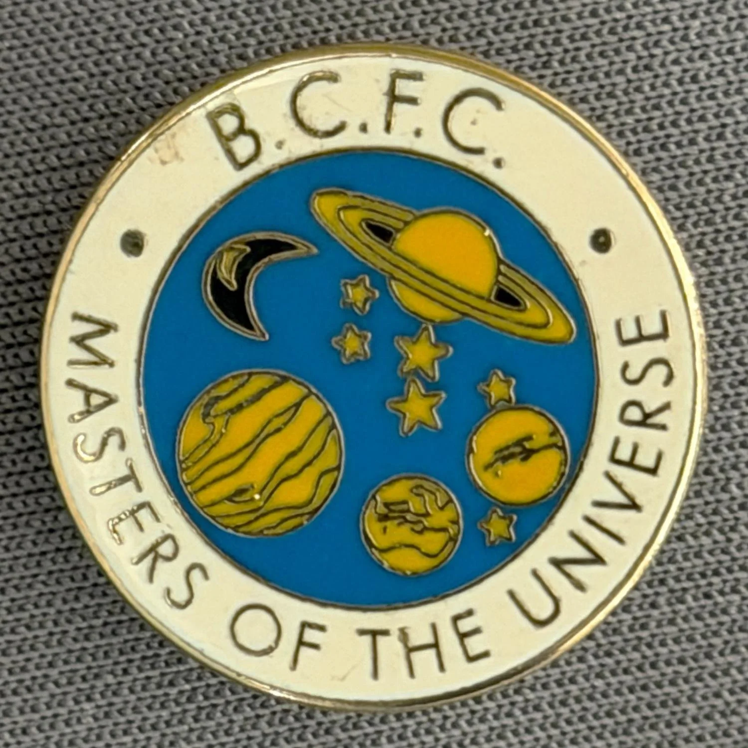 Reference Number: BCUN068
Size: D 19 mm
Pin Type: Brooch Pin
Plating: Gold
Value: £5
Manufacturer: Unknown
Comments: BCFC Masters of the Universe