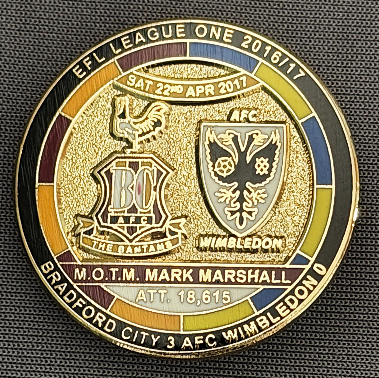Reference Number: BCFIX391
Size: D 29.4 mm
Pin Type: Brooch Pin
Plating: Gold
Value: £8
Manufacturer: Bradford City Badges
Comments: Bradford City v AFC Wimbledon 2015/16, Limited Edition of 50 Badges (Gold Version)
