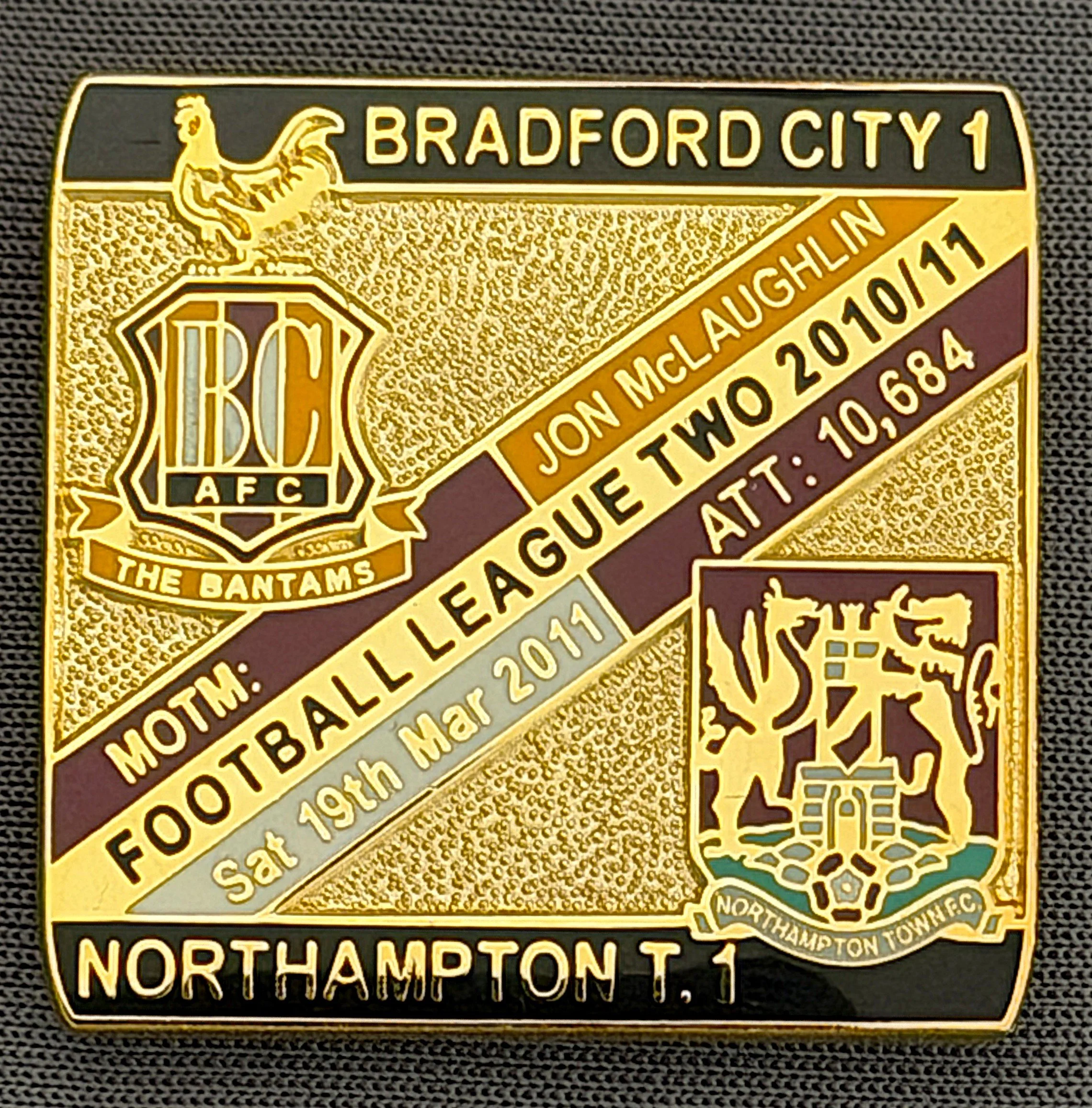Reference Number: BCFIX064
Size: H 28.3 mm x W 29.3 mm
Pin Type: Brooch Pin
Plating: Gold
Value: £8
Manufacturer: Bradford City Badges
Comments: Bradford City v Northampton Town  2010/11 Limited Edition 100 Badges