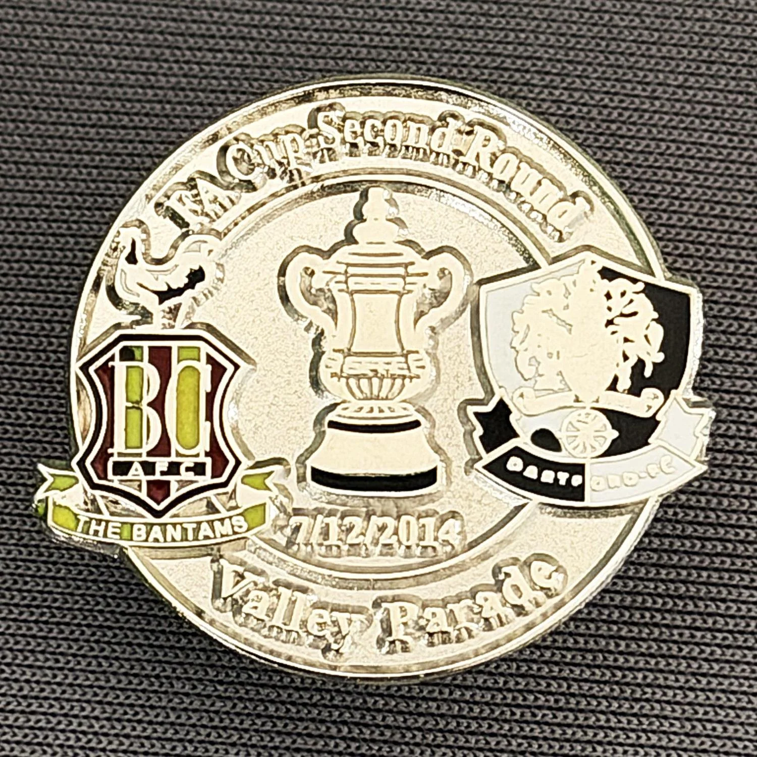 Reference Number: BCFAC073
Size: H 23.3 mm x W 25.6 mm
Pin Type: Metal Clutch
Plating: Silver
Value: £4
Manufacturer: Dan Lloyd
Comments: F.A. Cup Second Round 2014/15, v Dartford, Silver Version