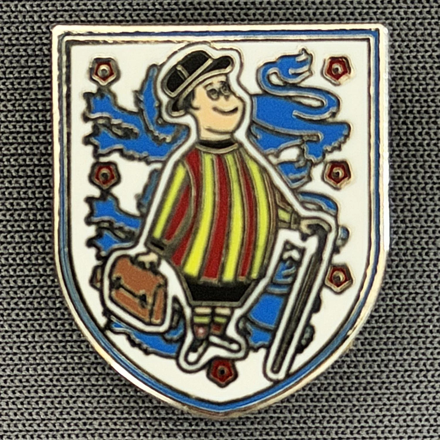 Reference Number: BCGEN119
Size: H 20.8 mm x W 17.7 mm
Pin Type: Brooch Pin
Plating: Silver
Value: £6
Manufacturer: Unknown
Comments: City Gent 3 Lion Shield, Claret & Yellow Variation.