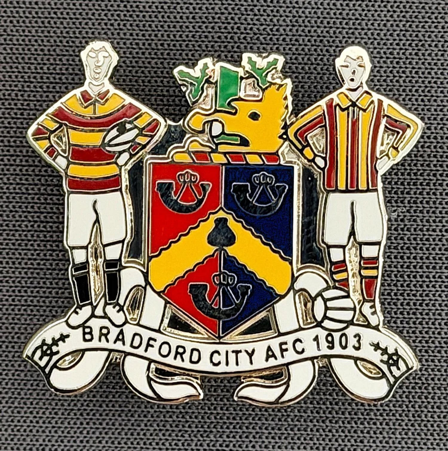 Reference Number: BCEVE045
Size: H 23 mm x W 25.1 mm
Pin Type: Brooch Pin
Plating: Silver
Value: £8
Manufacturer: Paraders
Comments: Bradford City Formation 1903