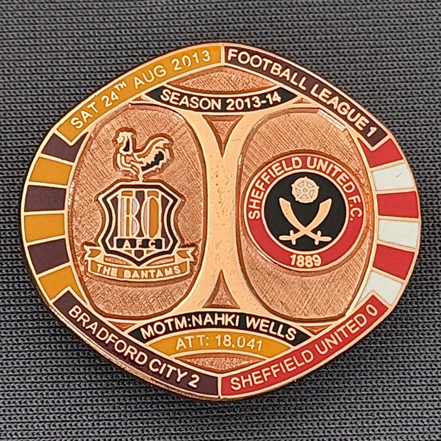 Reference Number: BCFIX232
Size: H 26.3 mm x W 28.9 mm
Pin Type: Brooch Pin
Plating: Copper
Value: £12
Manufacturer: Bradford City Badges
Comments: Bradford City v Sheffield United 2013/14, Limited Edition of 1 Badge (Copper Version)