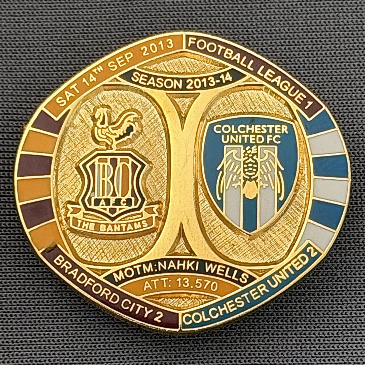 Reference Number: BCFIX188
Size: H 26.3 mm x W 28.9 mm
Pin Type: Brooch Pin
Plating: Gold
Value: £8
Manufacturer: Bradford City Badges
Comments: Bradford City v Colchester United 2013/14 Limited Edition 55 Badges
