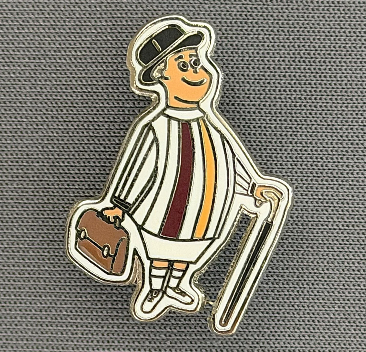 Reference Number: BCGEN103
Size: H 24 mm x W 17.6 mm
Pin Type: Brooch Pin
Plating: Silver
Value: £6
Manufacturer: Unknown
Comments: City Gent, White Outline, Claret, White & Amber, White Shorts.