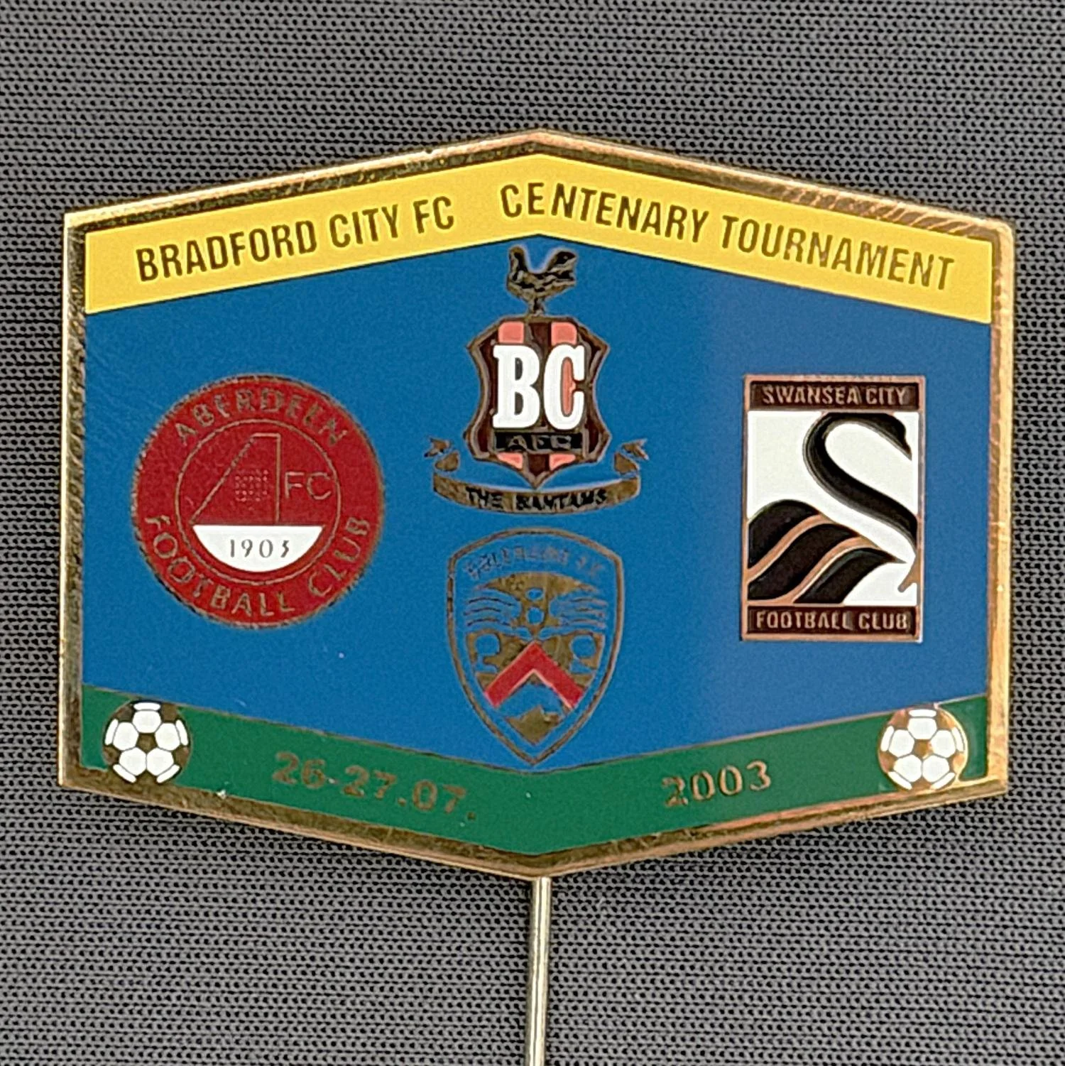 Reference Number: BCEVE018
Size: H 31.5 mm x W 39.6 mm
Pin Type: Stick Pin
Plating: Brass
Value: £12
Manufacturer: Russian
Comments: Centenary Tournament 2003, Blue, Yellow & Green Version.